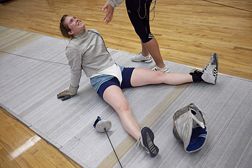 Swords down, hands up