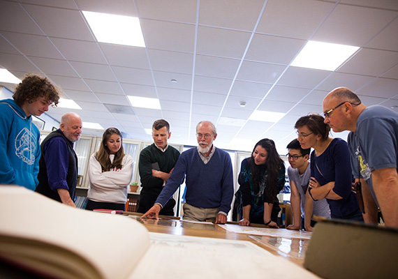 Research librarian Joseph Garver (center) provides historical context during a presentation to Gabriel Jandali-Appel ’16 (from left), Stephen Prina, Monica Palos ’15, Jesse Aron Green,  Deborah Montes '16, Michael Wang '14, Leonie Marinovich, and Greg Marinovich.