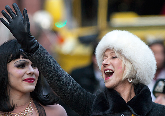 Mirren refused to let the brisk weather hamper her enthusiasm along the parade route. Jon Chase/Harvard Staff Photographer