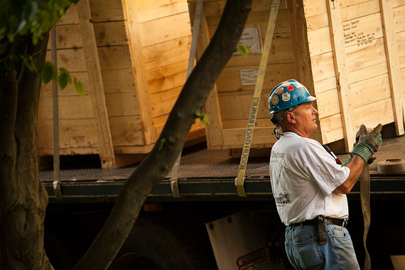 Ziggy Bialek prepares to remove the new Memorial Church bell from a wooden crate. The bell replaced the original one cast in 1926, which had cracked. Photos by Stephanie Mitchell/Harvard Staff Photographer