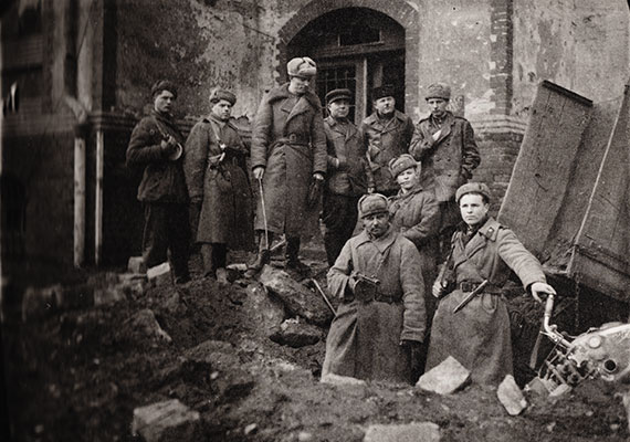 This portrait of a March 1945 command inspection of an observation station in Breslau shows Jewish soldier Dimitry Shore (far left). 