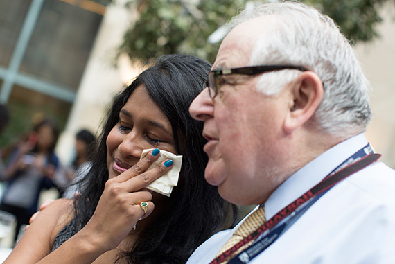 Daniel D. Federman Professor of Medicine and Medical Education at Harvard Medical School Ronald Arky talks with Samyukta Mullangi, who cries tears of joy. She is heading to University of Michigan Hospital. Photo by Rose Lincoln/Harvard Staff Photographer
