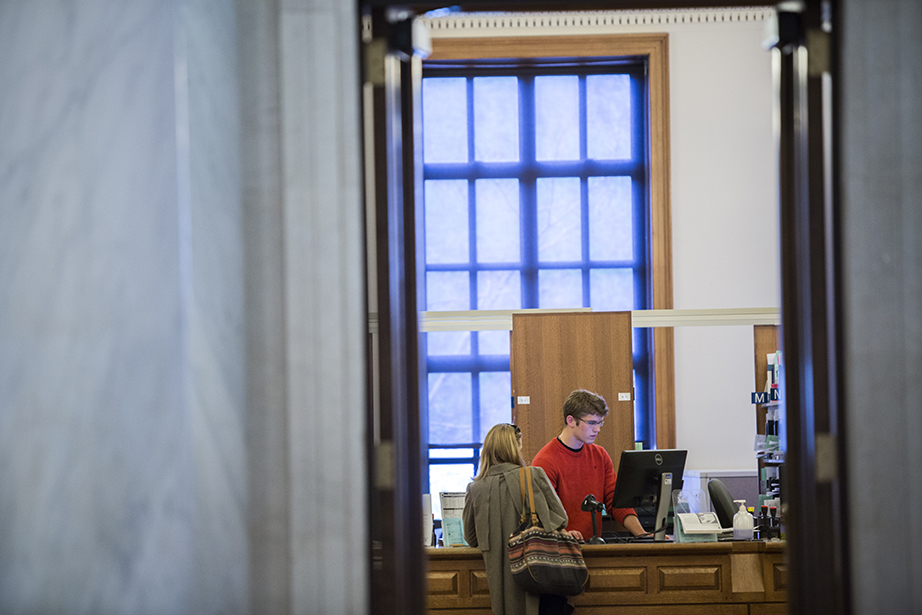 Daniel Letchford ’17 works at Widener’s circulation desk.