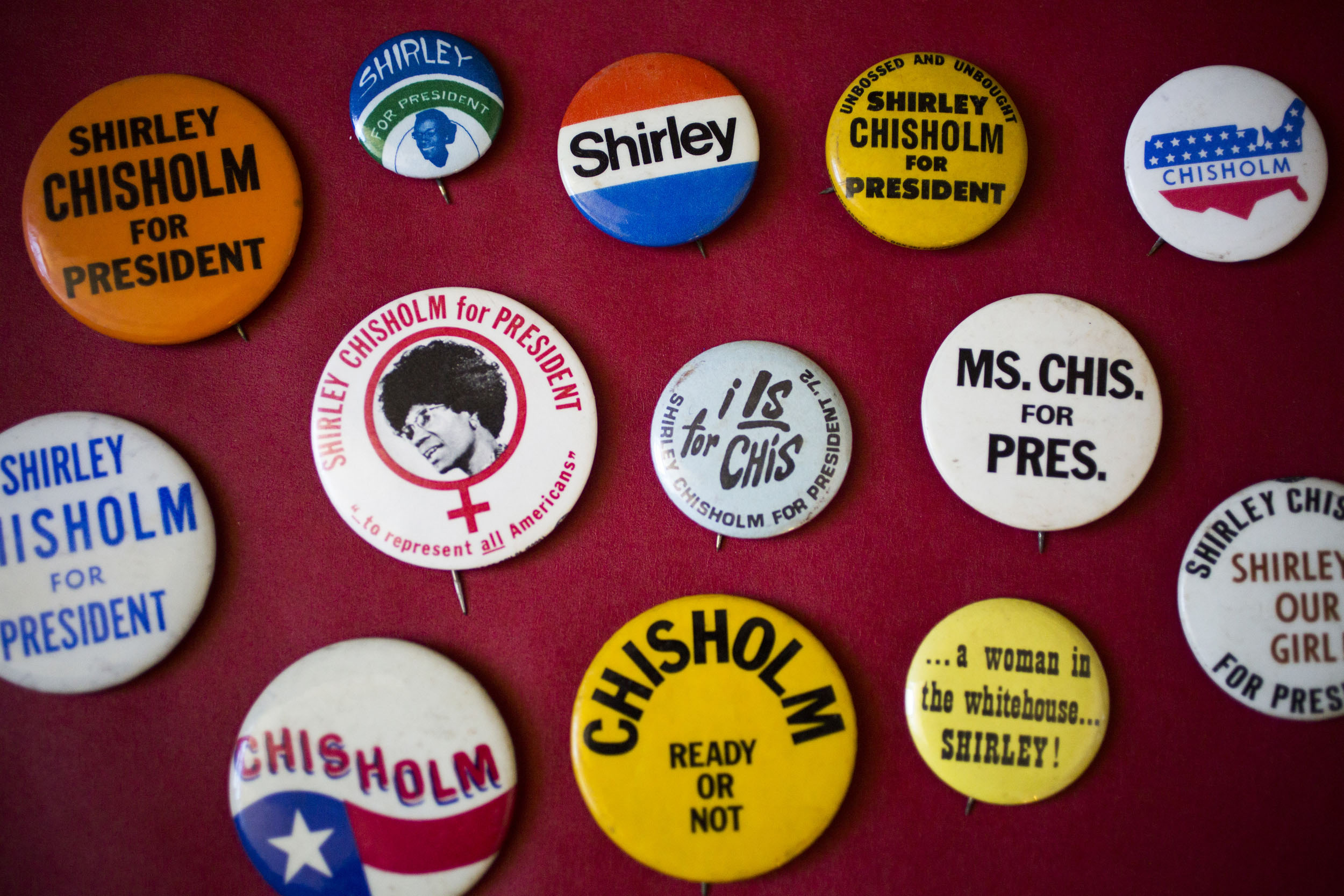 Campaign buttons from 1972 for Shirley Chisholm.