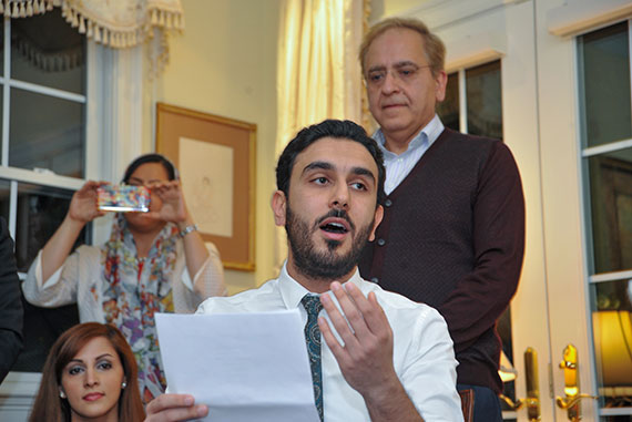 Host Cumrun Vafa listens to singer Parham Haghighi, who joins other performers of Persian music in a tribute to Hawking. 