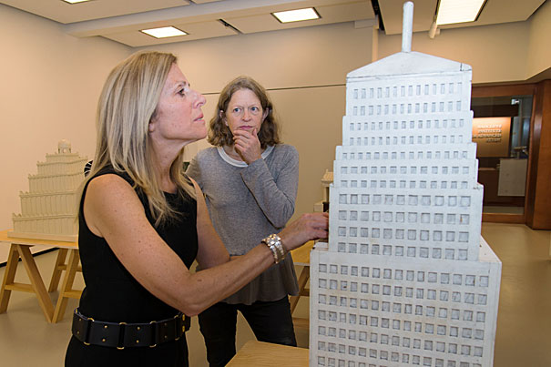 Artist Wendy Jacob has created an installation with the blind and hearing impaired in mind. She tours the exhibit with writer, Nina Livingstone, (hands shown) who is blind and hearing impaired. The exhibit features vibrating walls and architectural models from schools for the blind and is housed at the Johnson-Kulukundis Family Gallery in Byerly Hall. Kris Snibbe/Harvard Staff Photographer