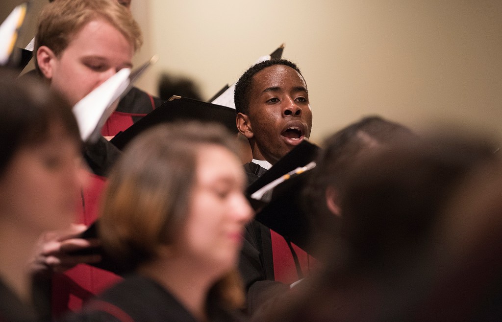 Sydney Mukasa '18 sings.