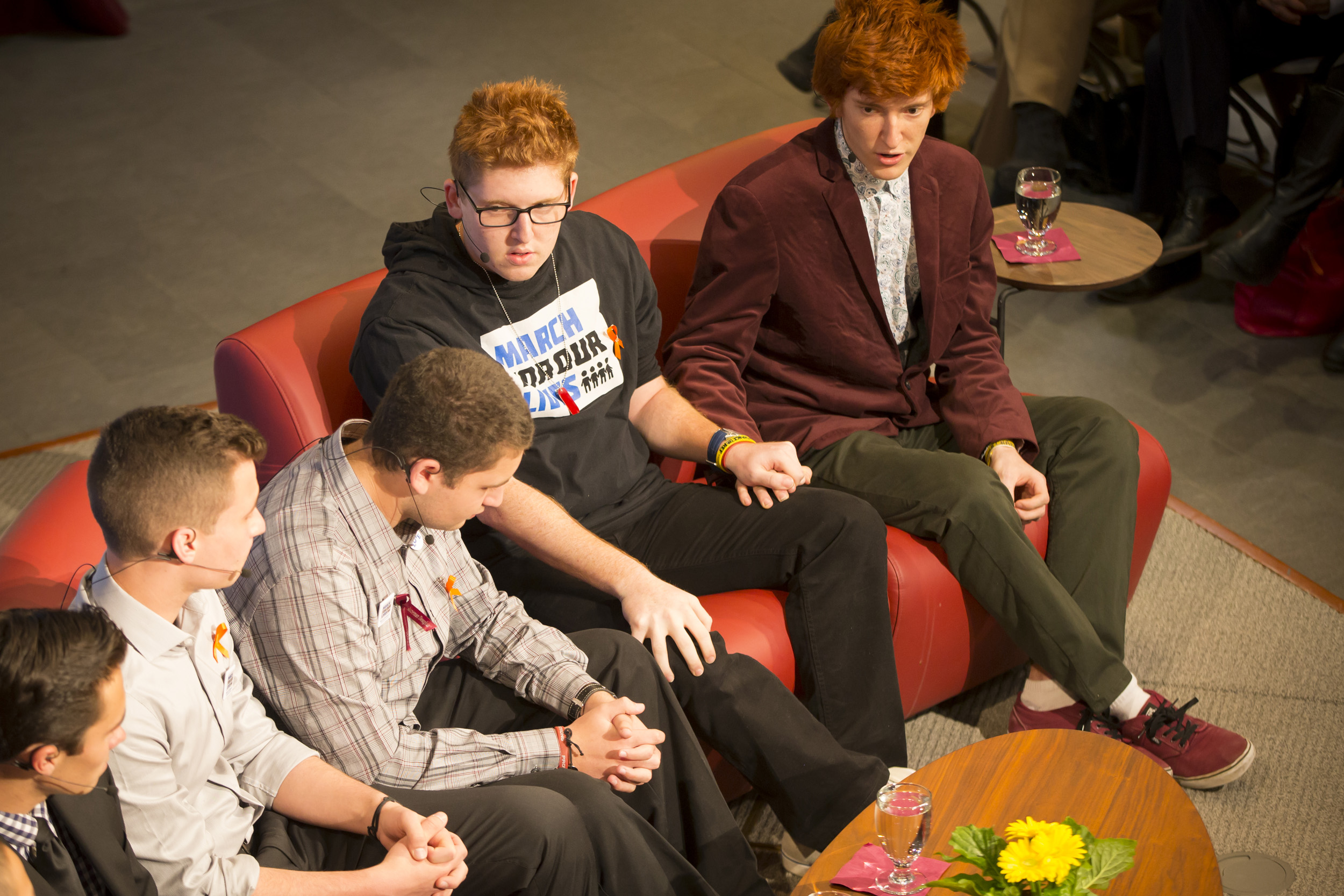 Brothers, Matt, left, and Ryan Deitsch clasp hands.