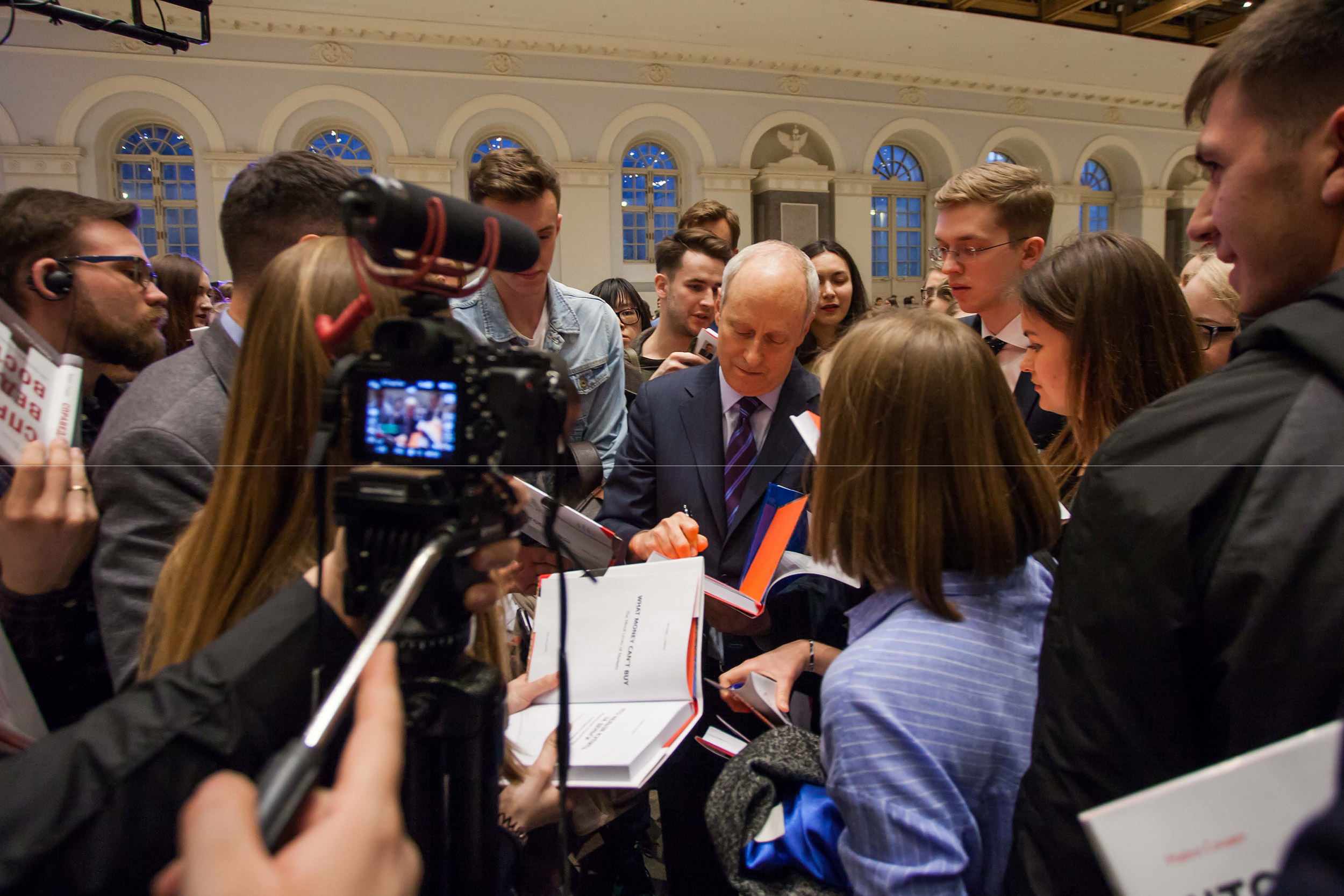 Michael Sandel signing books