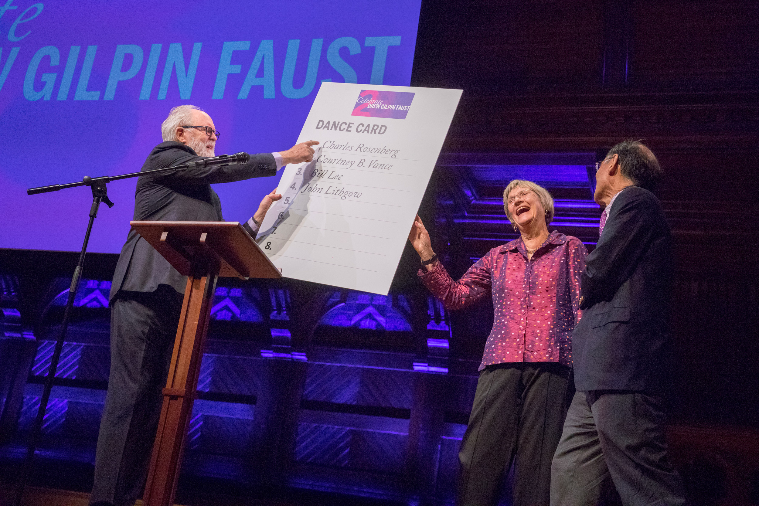 John Lithgow on stage with Drew Faust and Bill Lee.