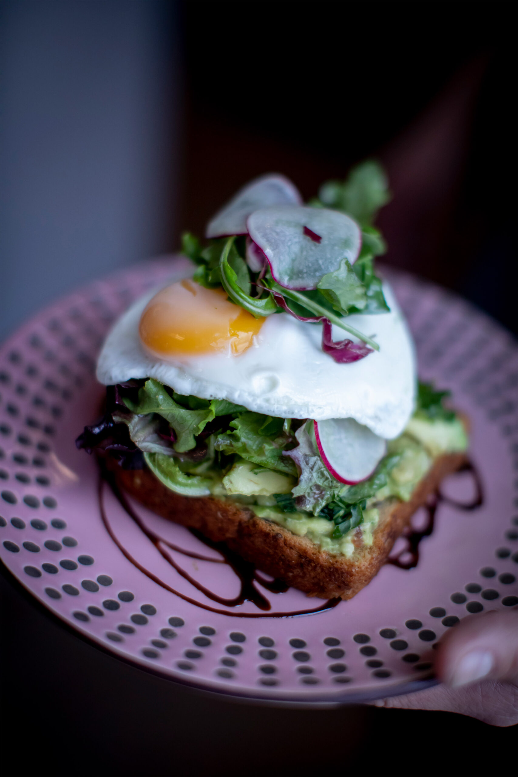 Avocado on toast with a fried egg