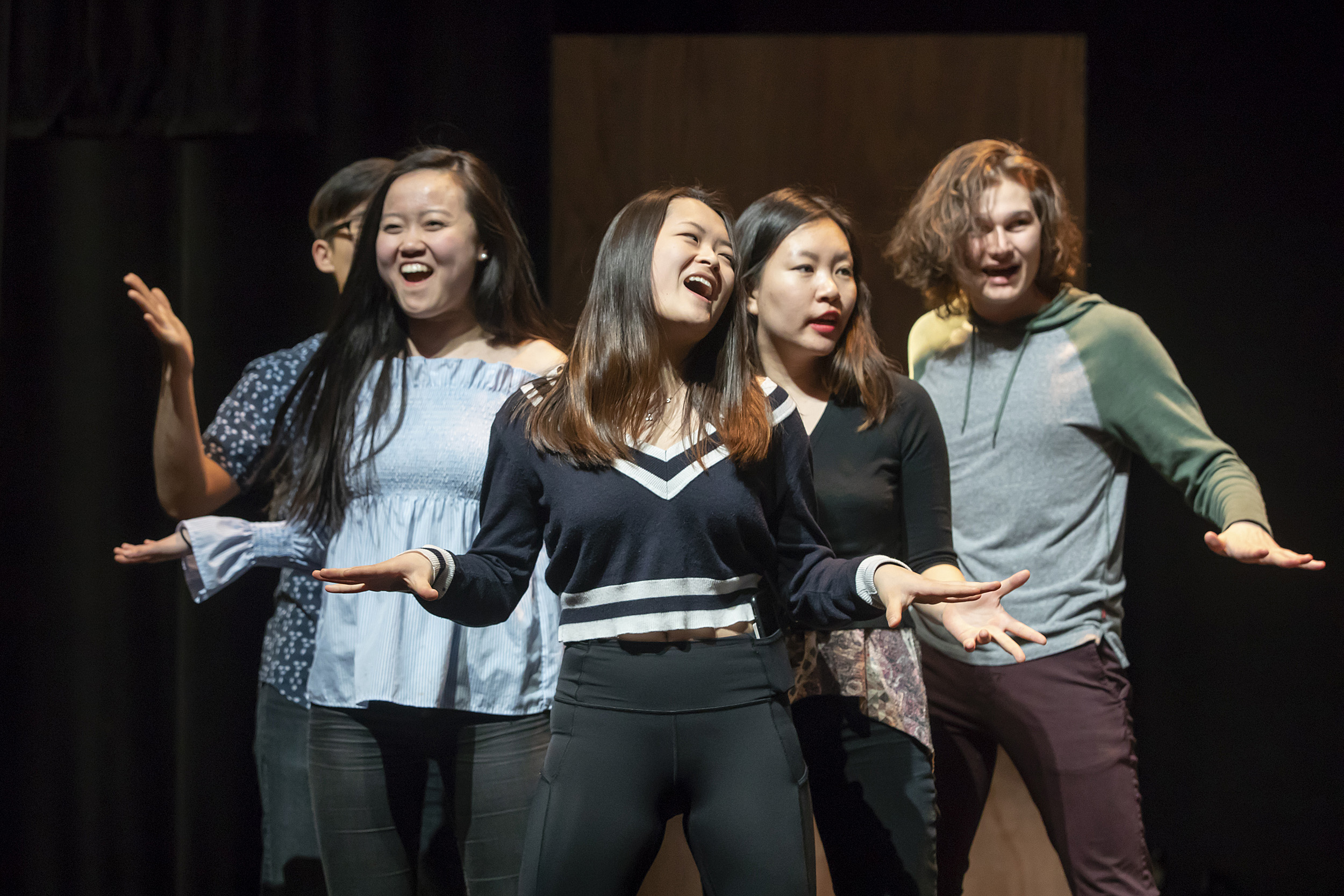 Performers dancing and singing