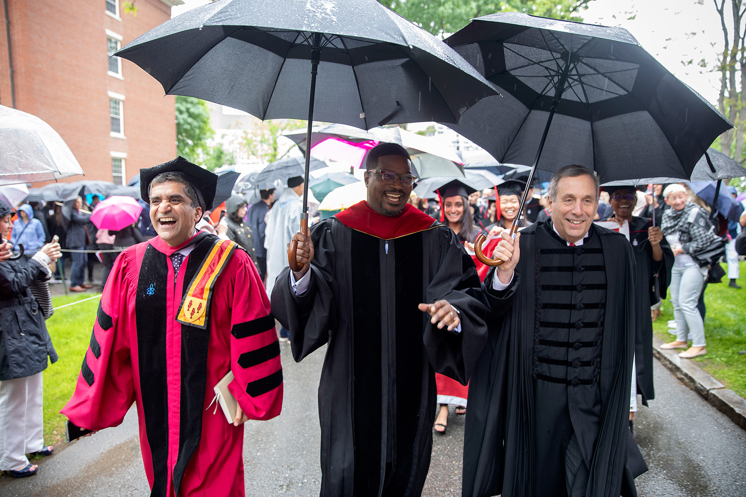 Rakesh Khurana, Jonathan Walton, and Larry Bacow lead the procession.