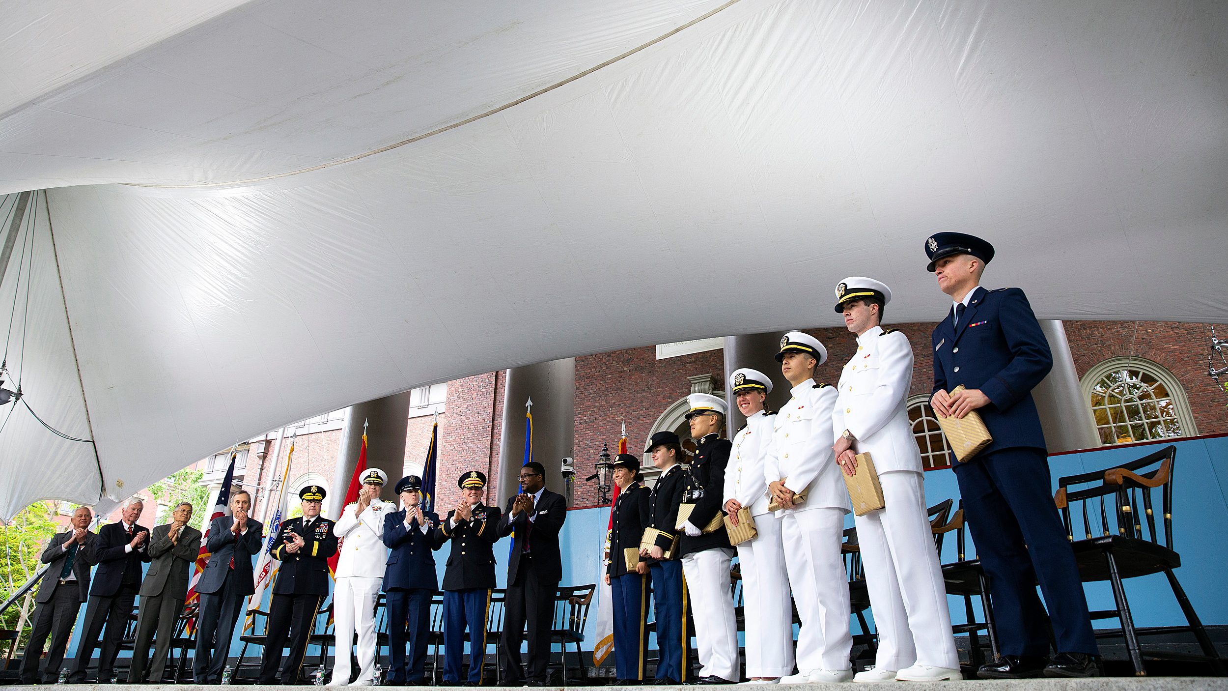 Seven Harvard undergrads received their military assignments during the ROTC commissioning ceremony at Tercentenary Theatre today.