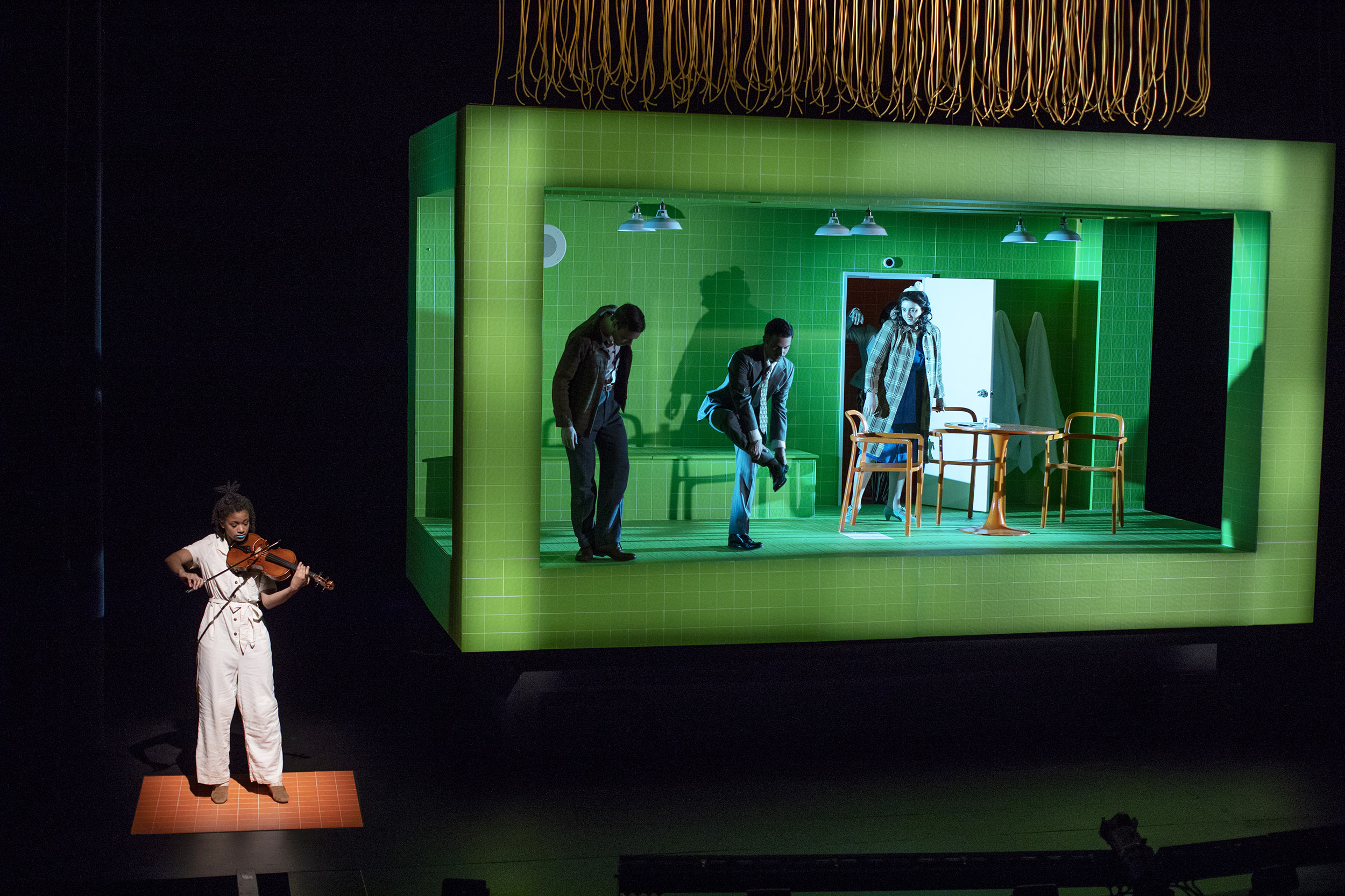 Cast of The Danube rehearses on stage.