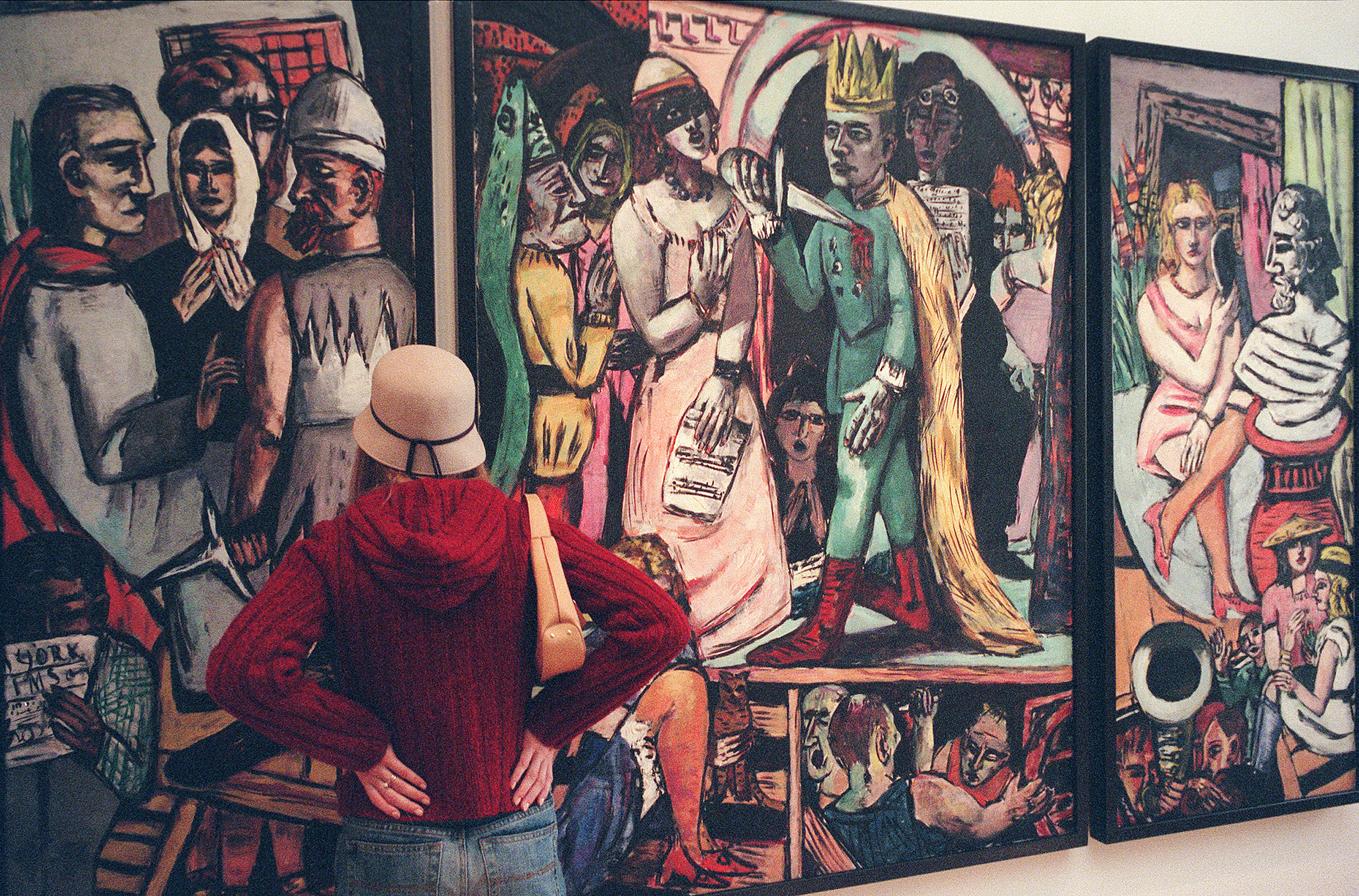 A patron views Max Beckmann's "The Actors" at the Busch-Reisinger Museum.