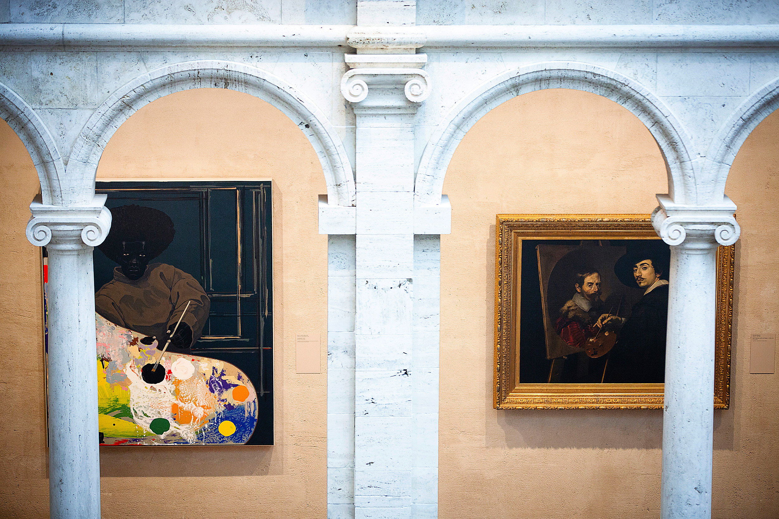 Works by Kerry James Marshall and Nicolas Régnier viewed through archways at Harvard Art Museums.