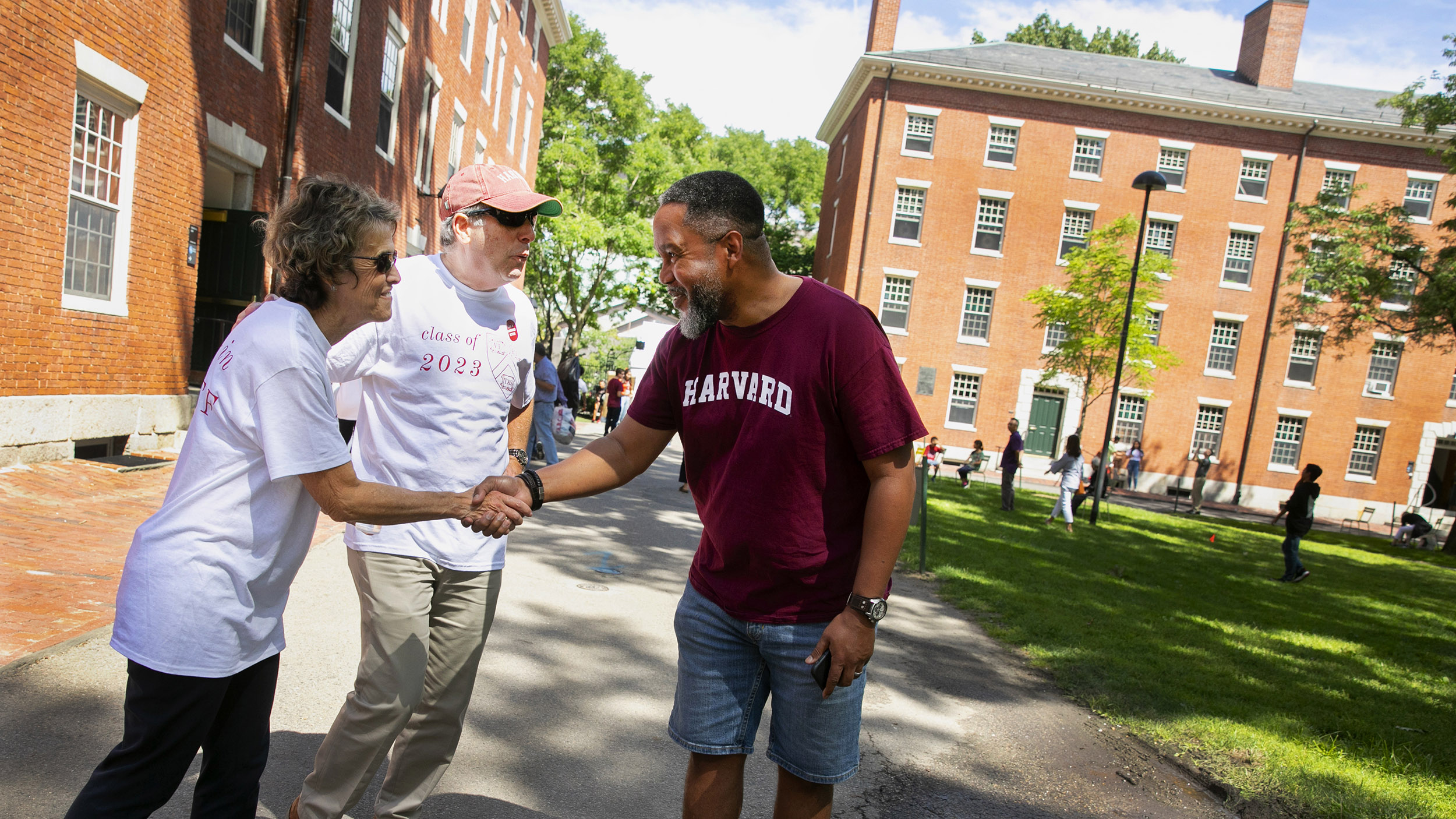 Adele and Larry Bacow greet first-year-parent Mike Campbell