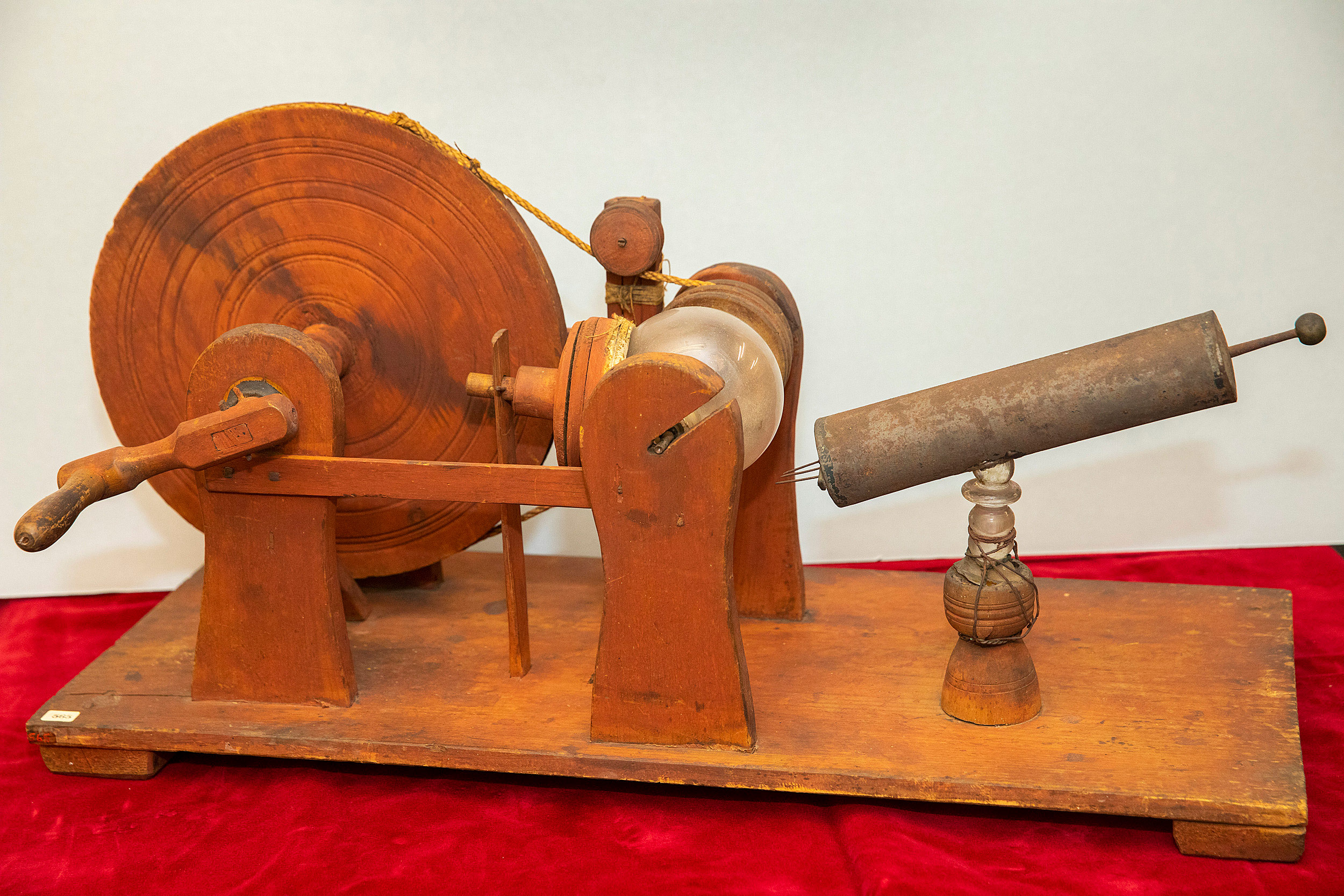 This globe electrical machine (circa1750). Parts include an egg cup, broken goblet, and cookie press.