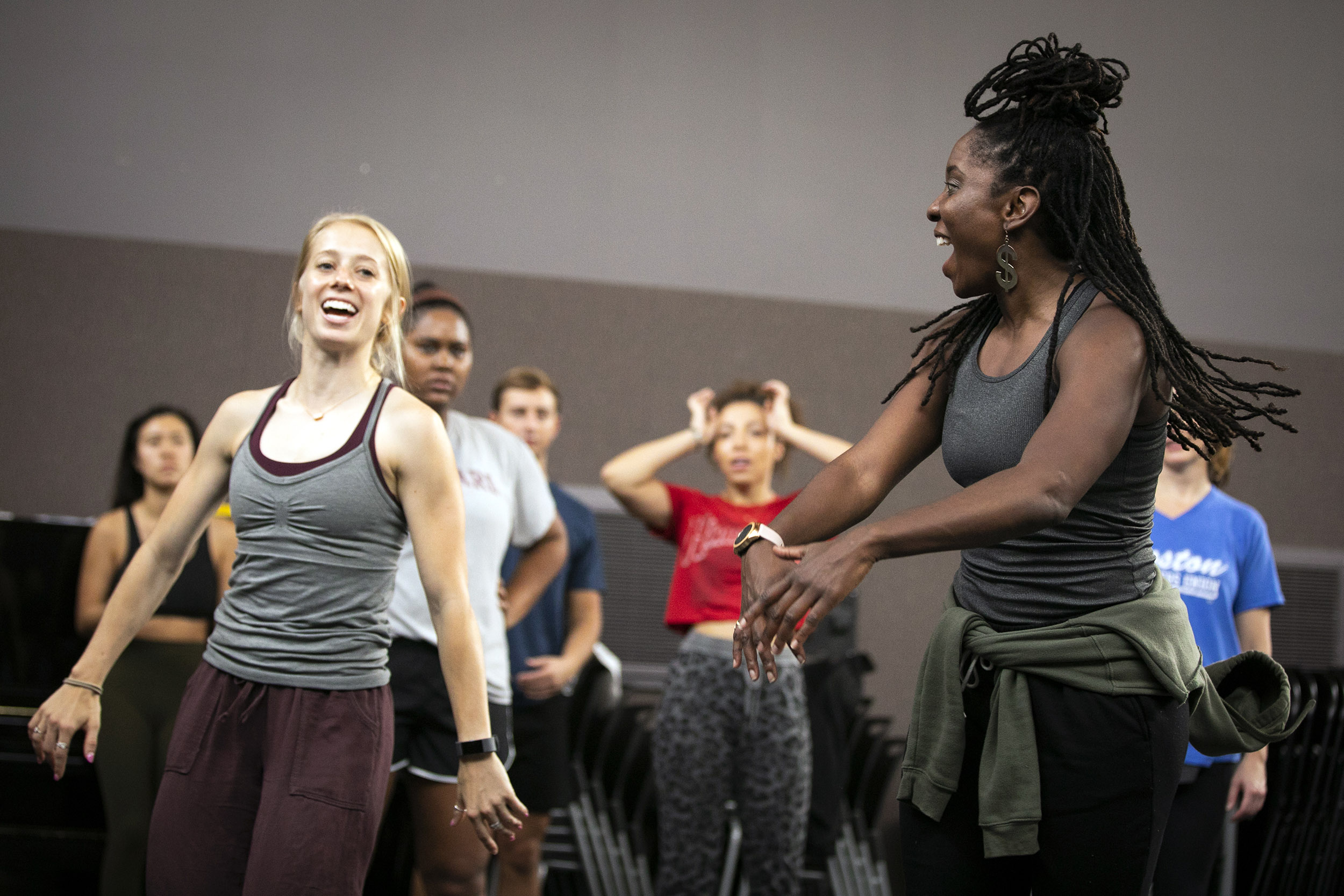 Meghan Tveit and Aysha Upchurch dance during class.