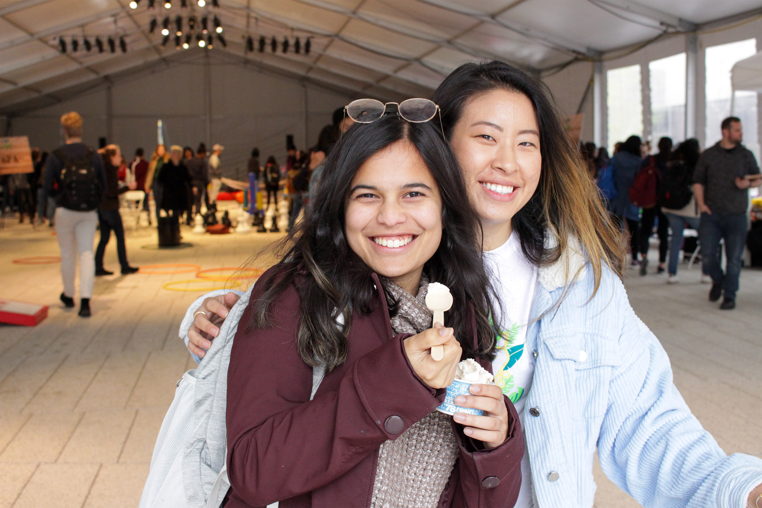 Two students at an ice cream social sponsored by CEB