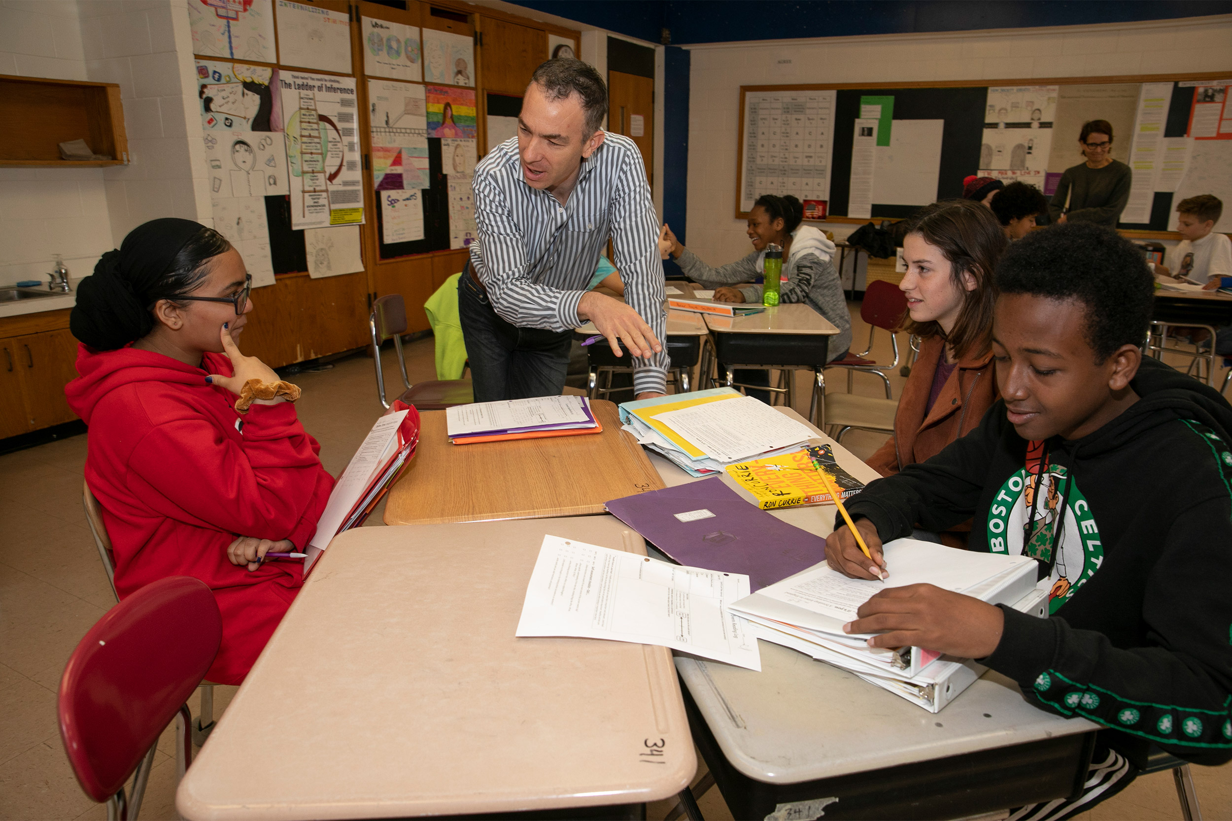 Teacher with students.