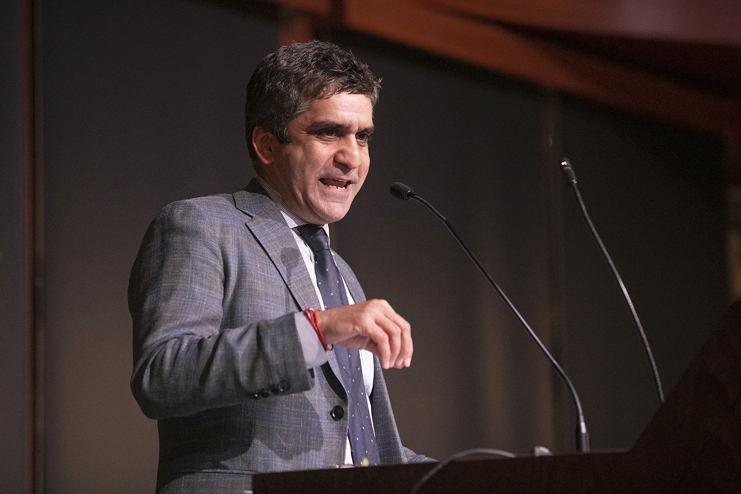 Harvard dean at the podium.