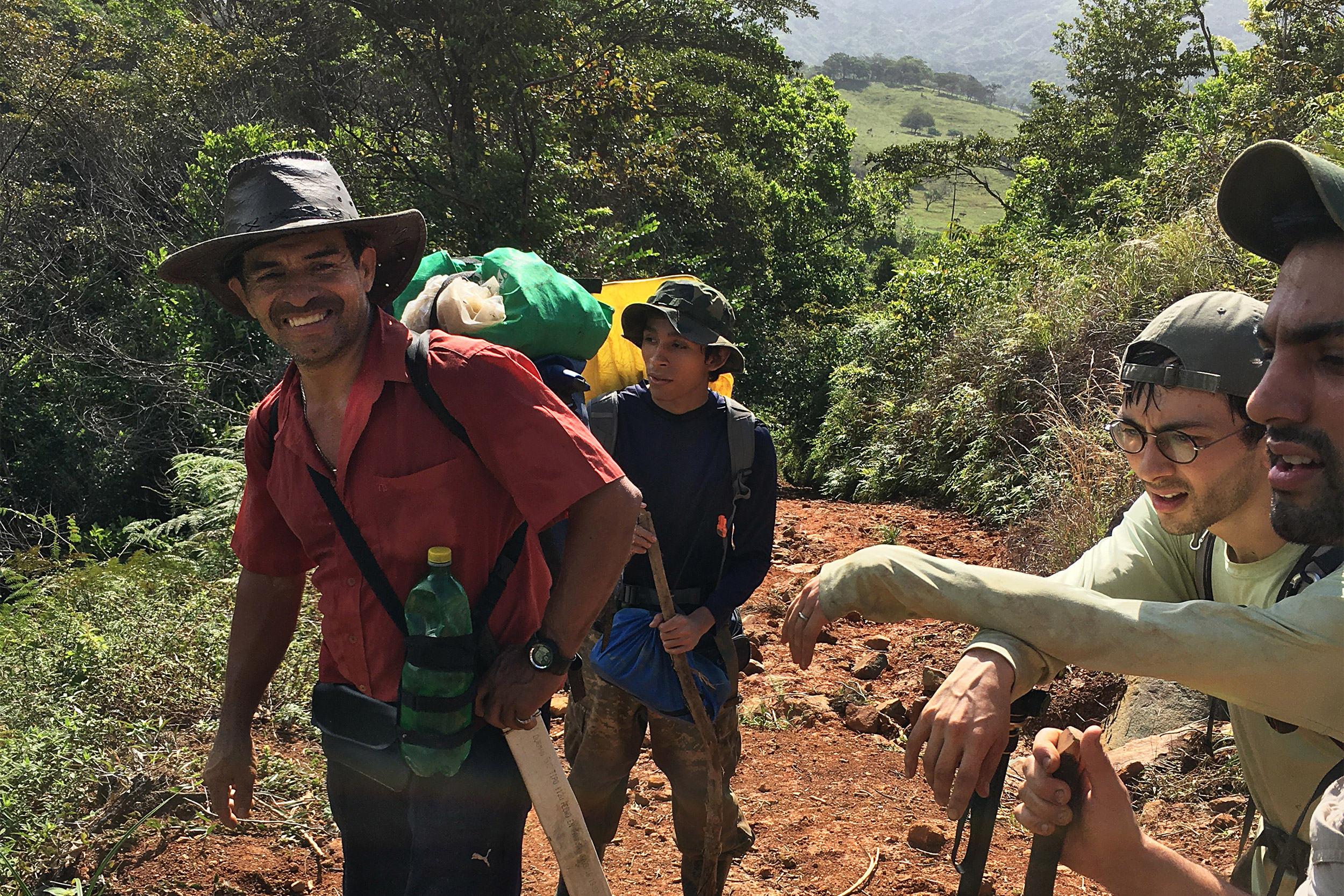 Students walking with packs.