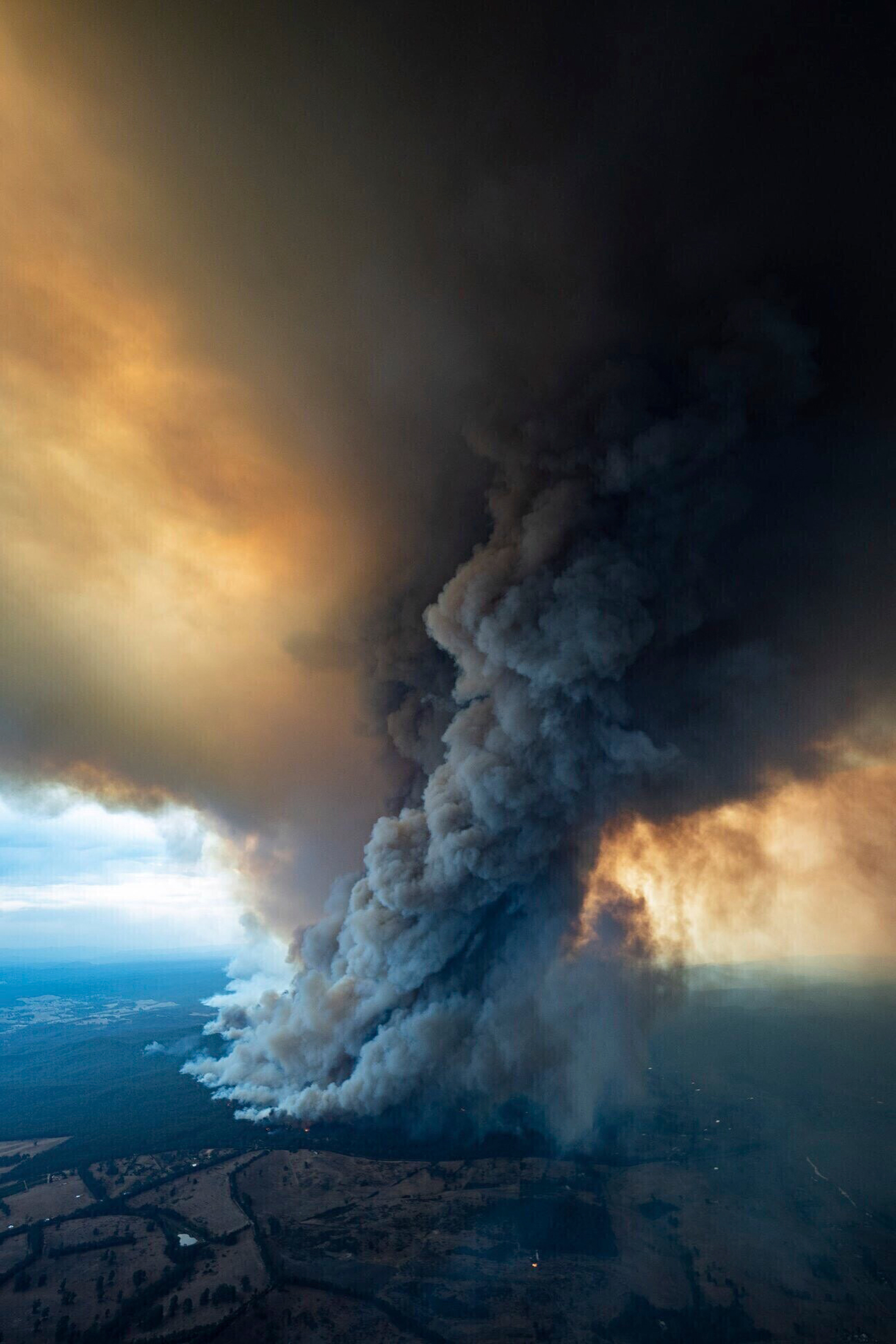 Aerial shot of massive plume of smoke rising from Australia wildfires.