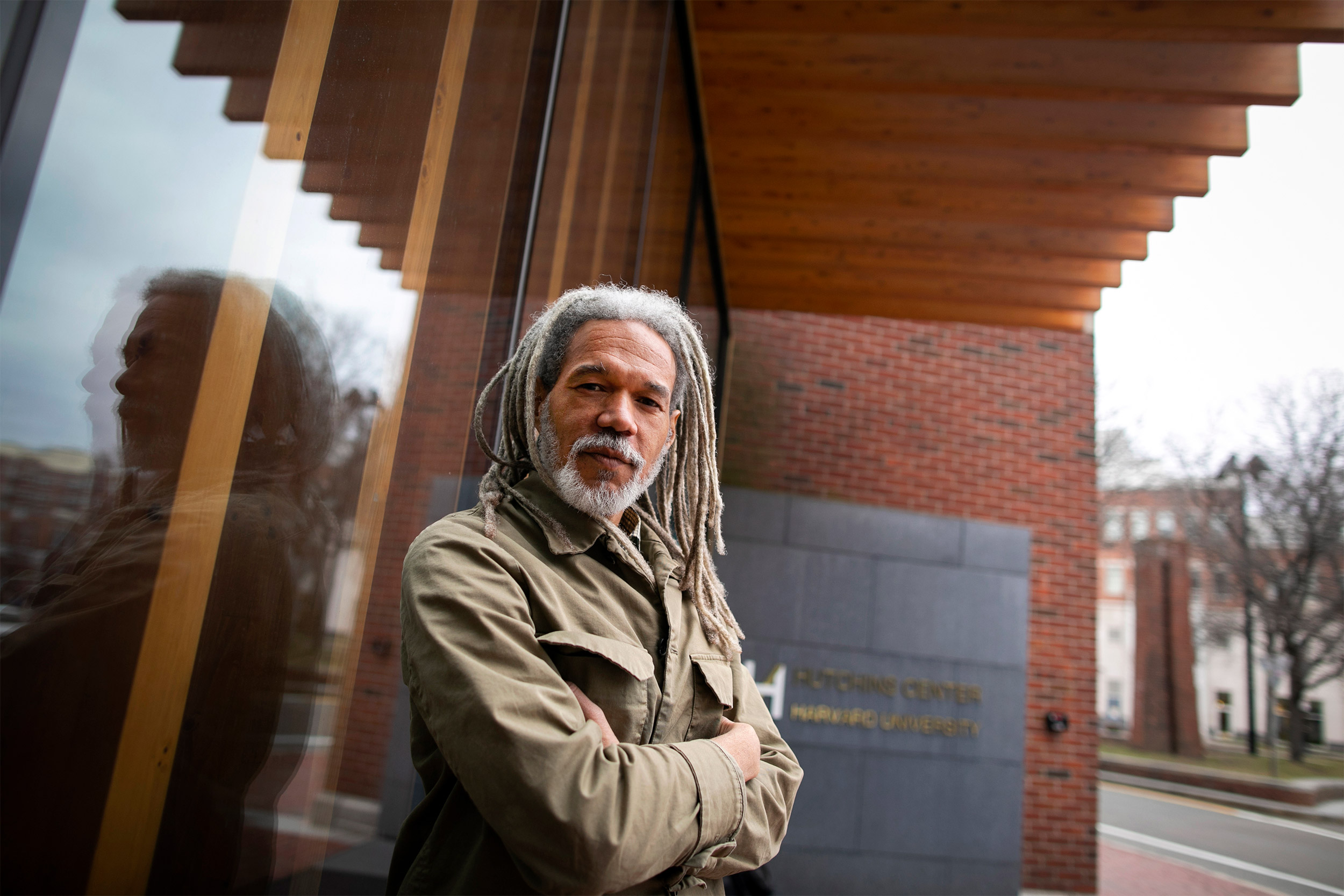 Vincent Brown posing by a building.