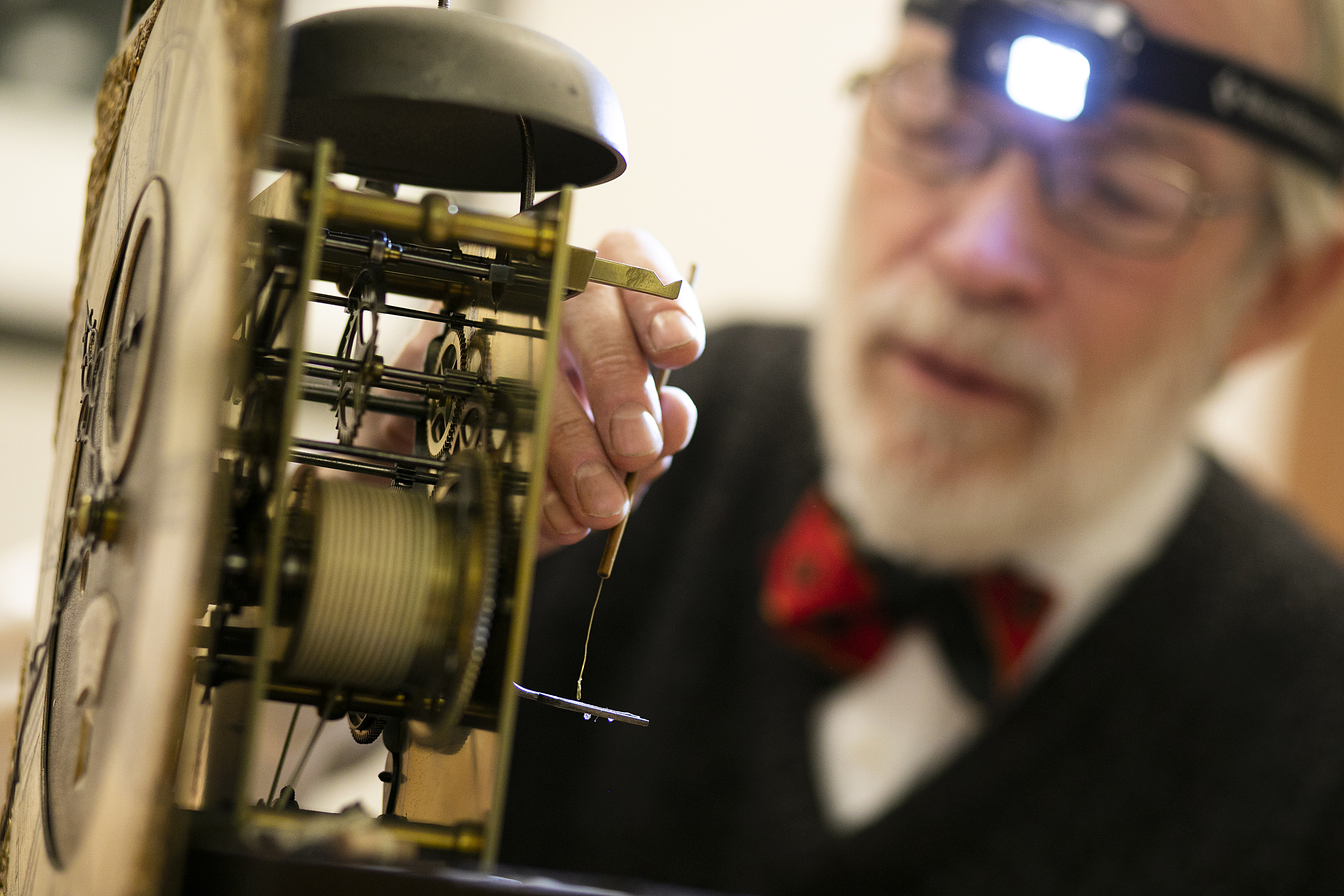 Richard Ketchen working on a clock.