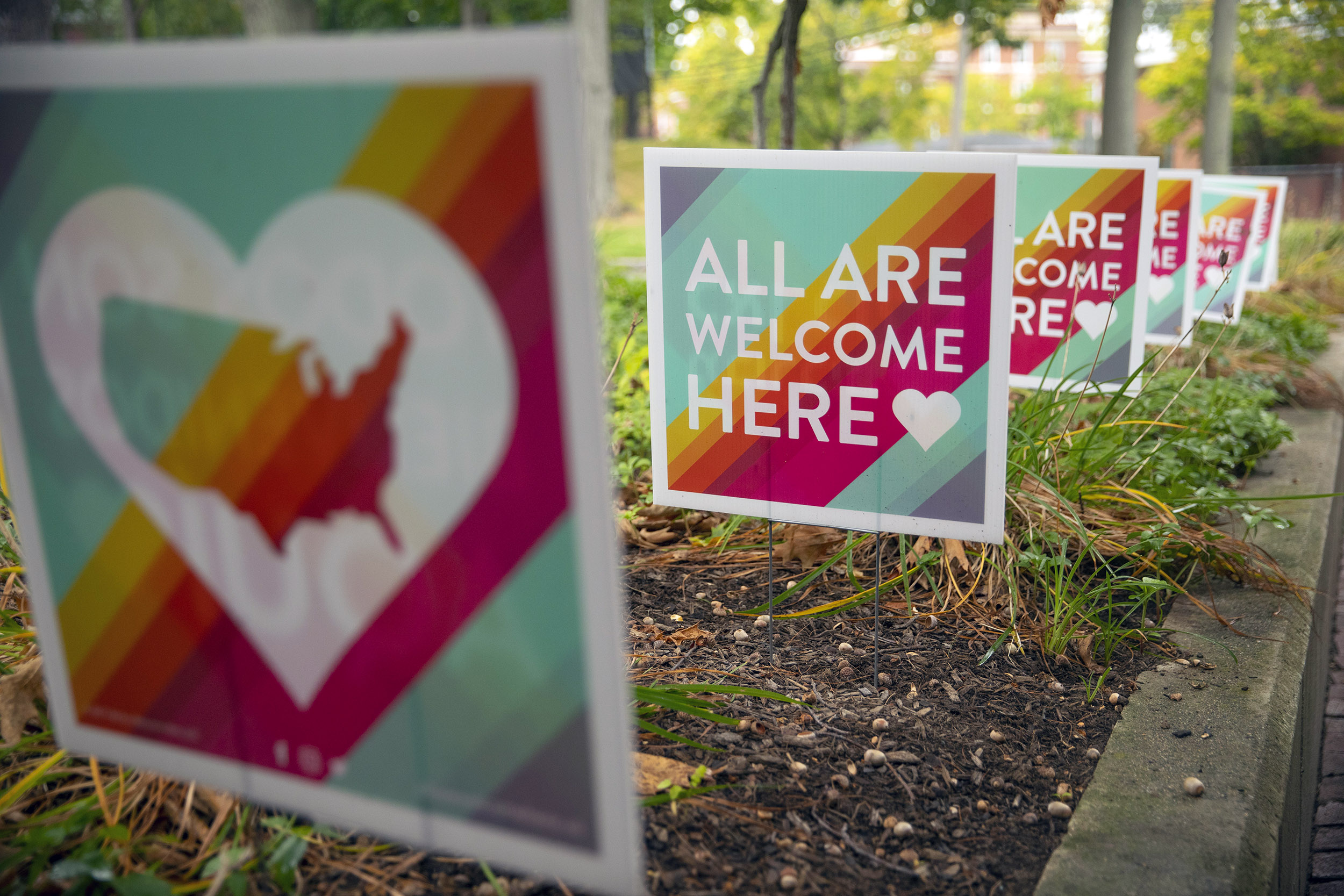 Welcoming signs in many languages offer a greeting outside the Office of the Arts Harvard Dance Center.