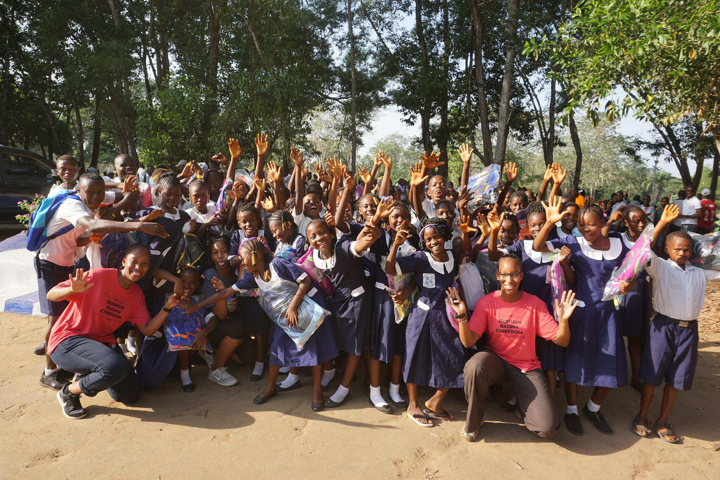 Suuba and Sadia Demby with children in Sierra Leone.