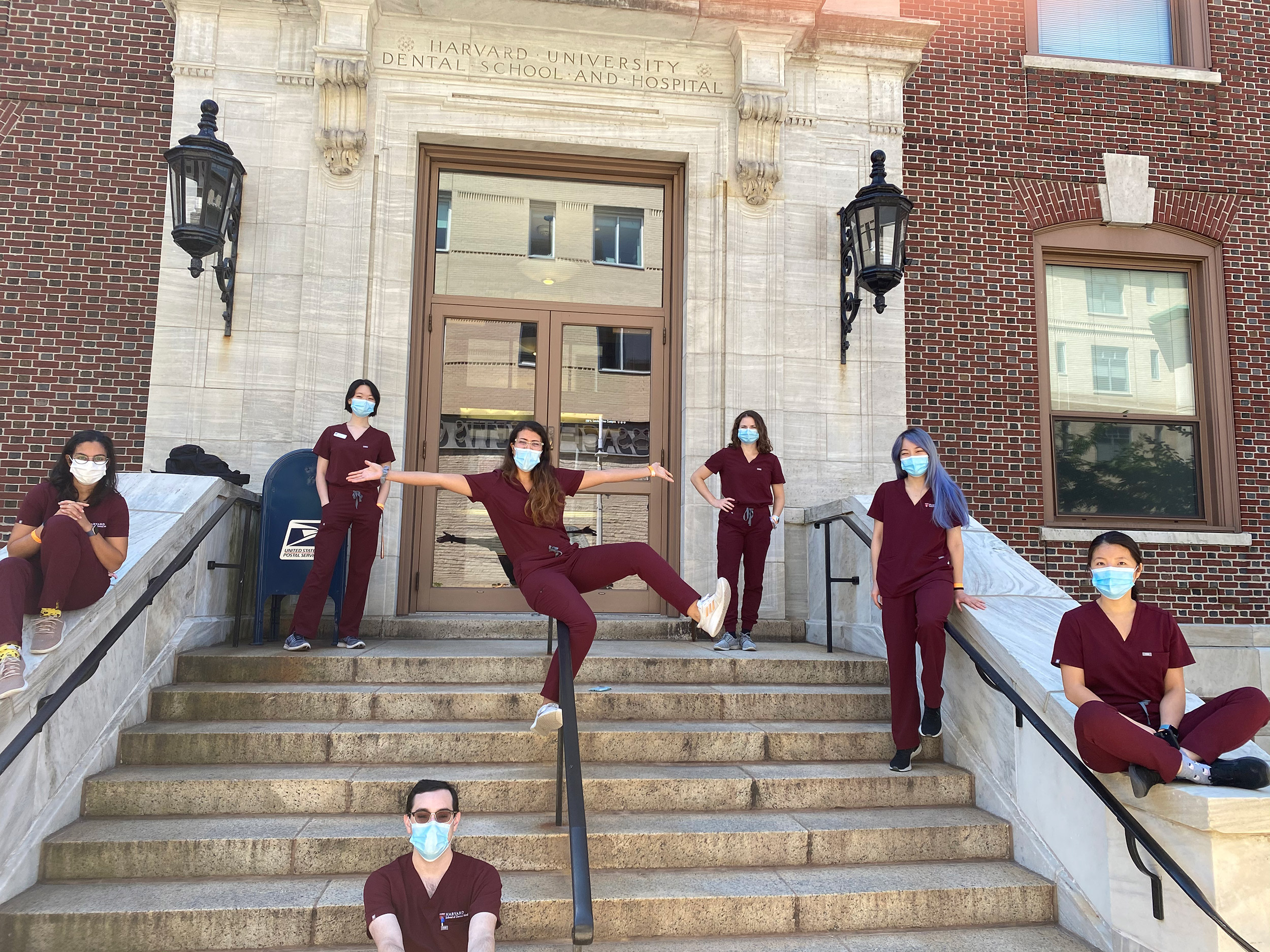 Ashiana Jivraj and a few classmates social-distancing outside the main entrance to HSDM.