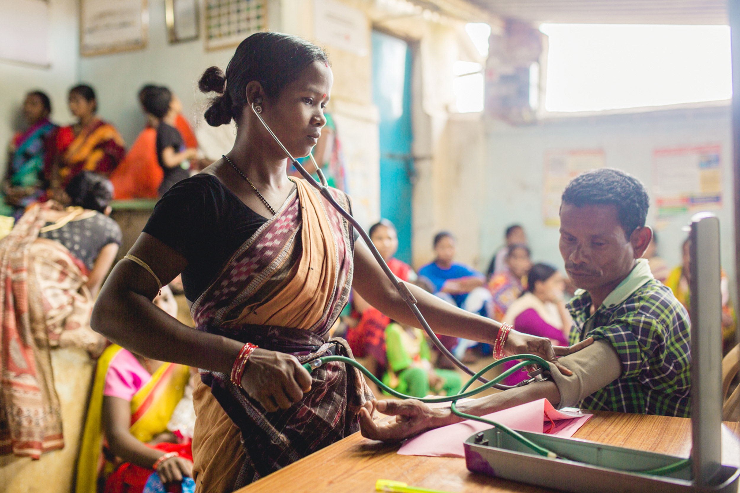 Woman with stethoscope.