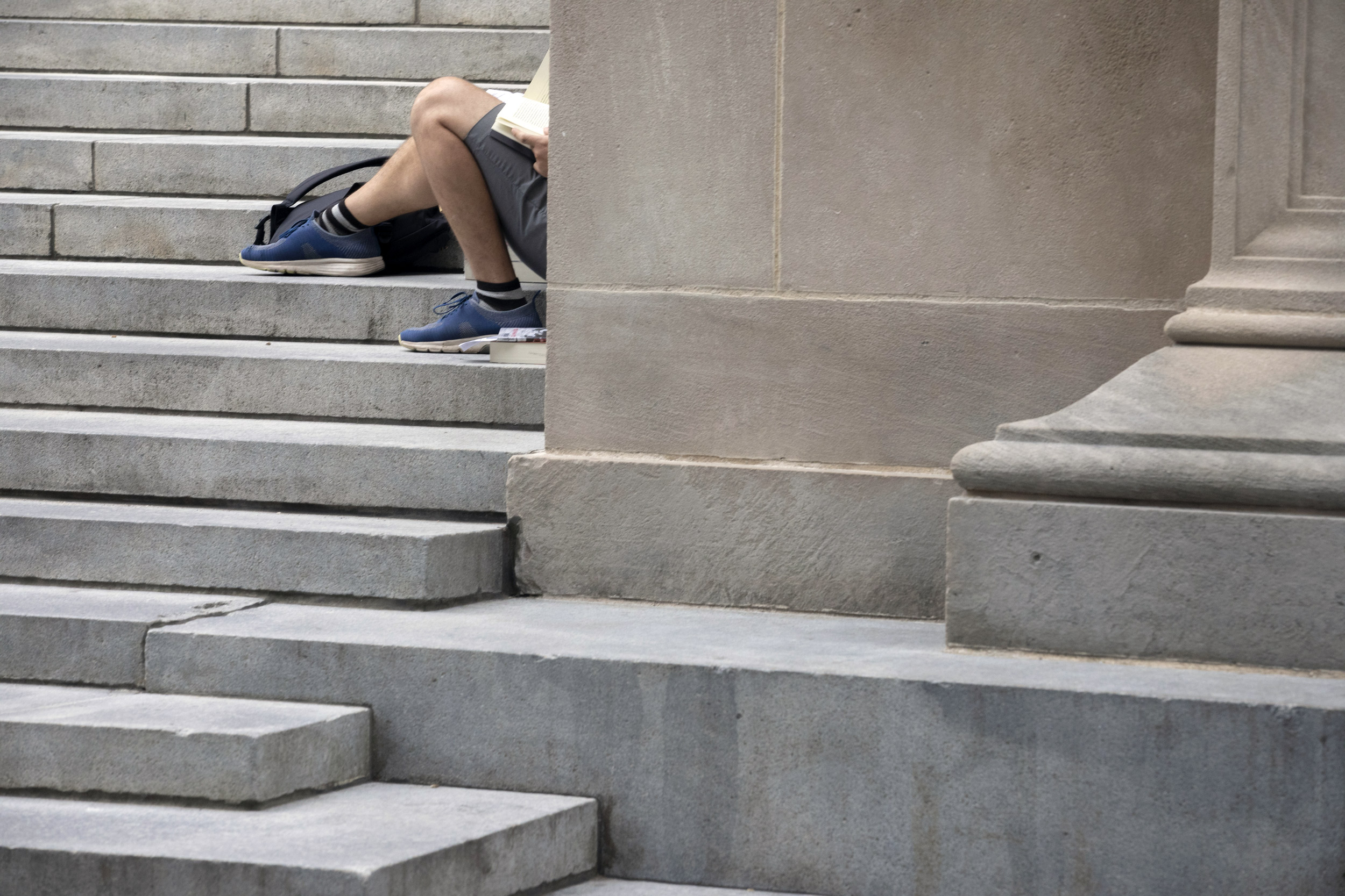 A student hits the books at Widener Library.