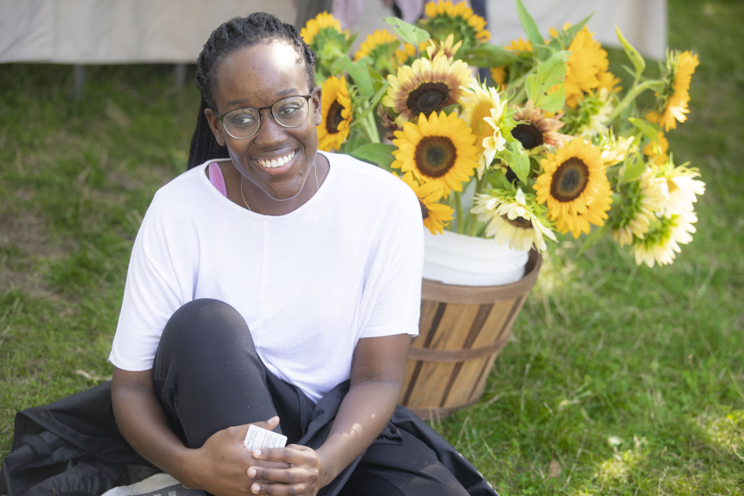 Woman with sunflowers.