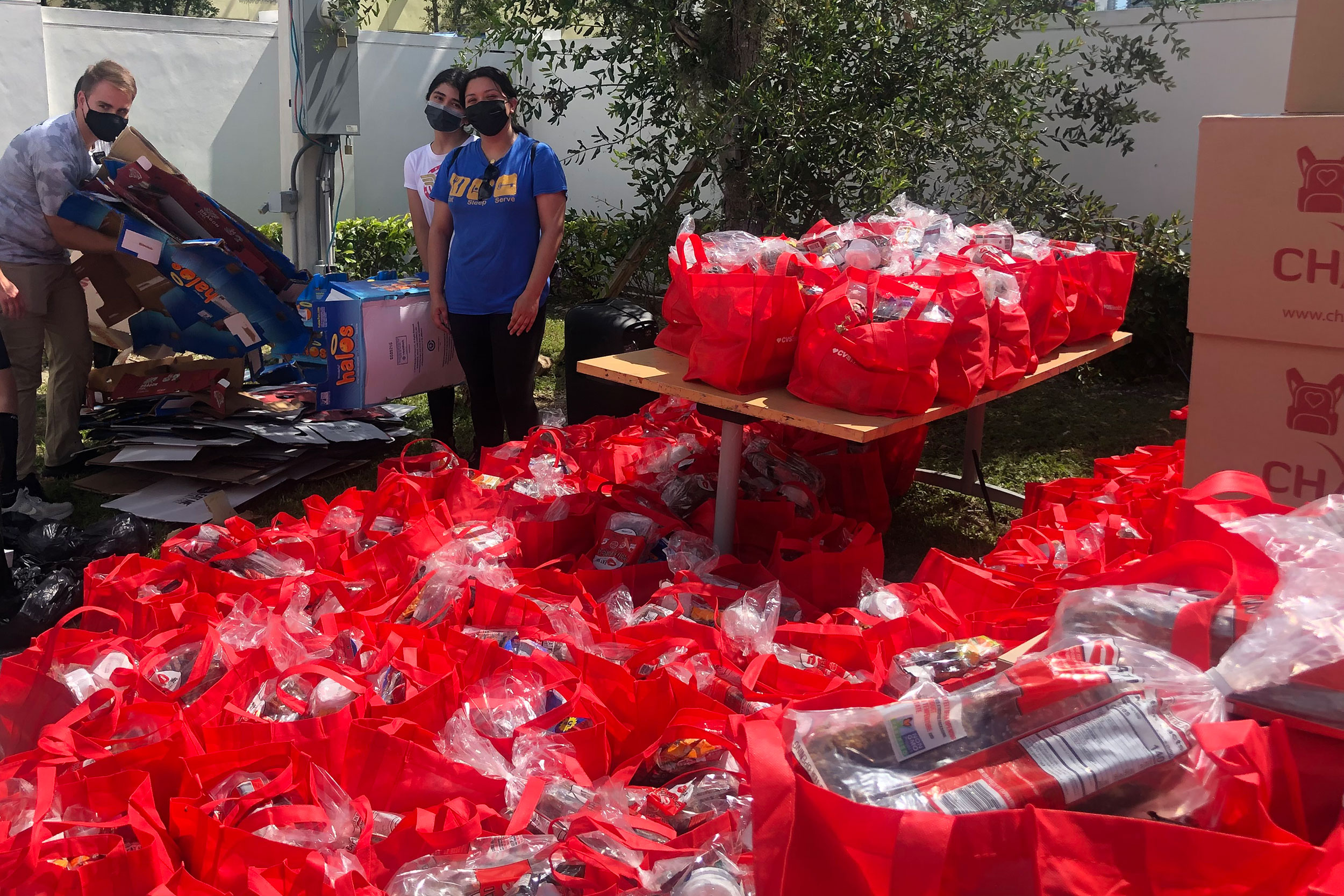 Alejandra Beltran with bags for the shelters.