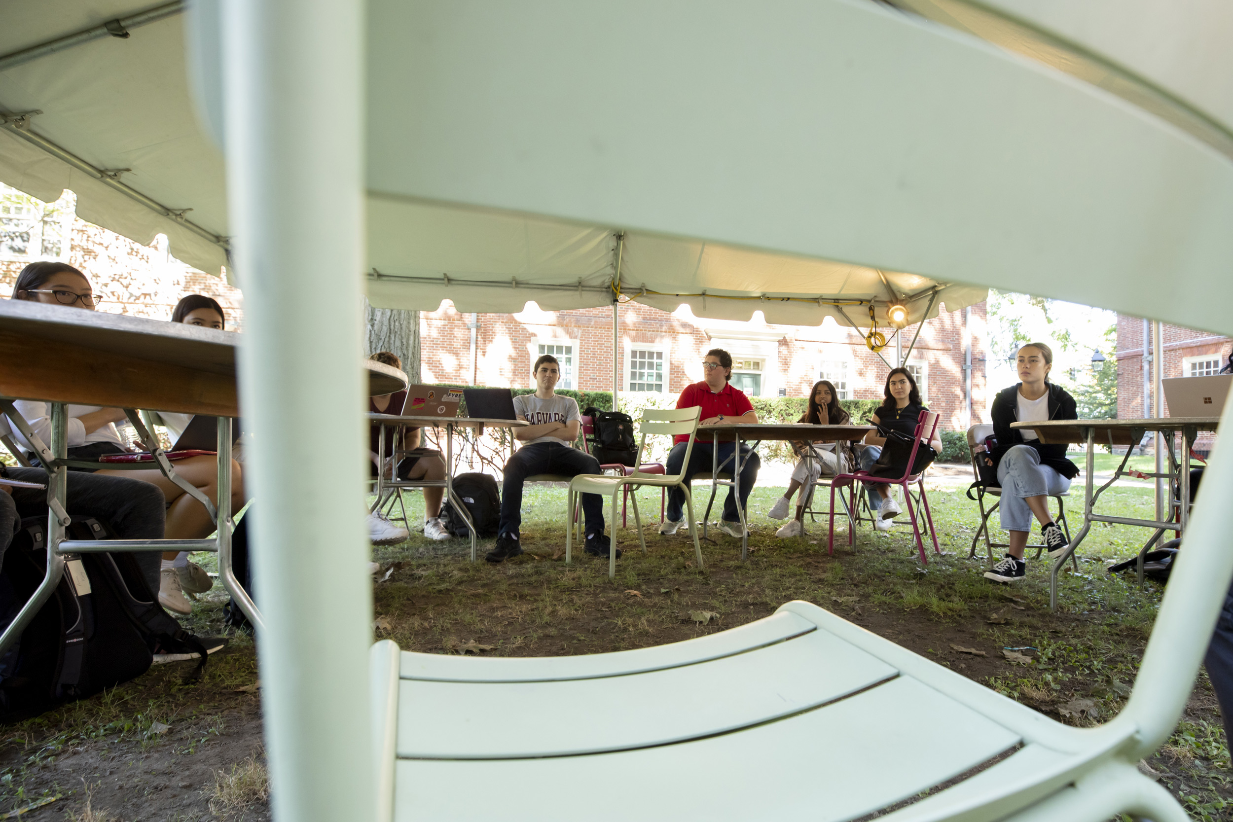 Students from William Whitham's Freshmen Seminar learn outside.