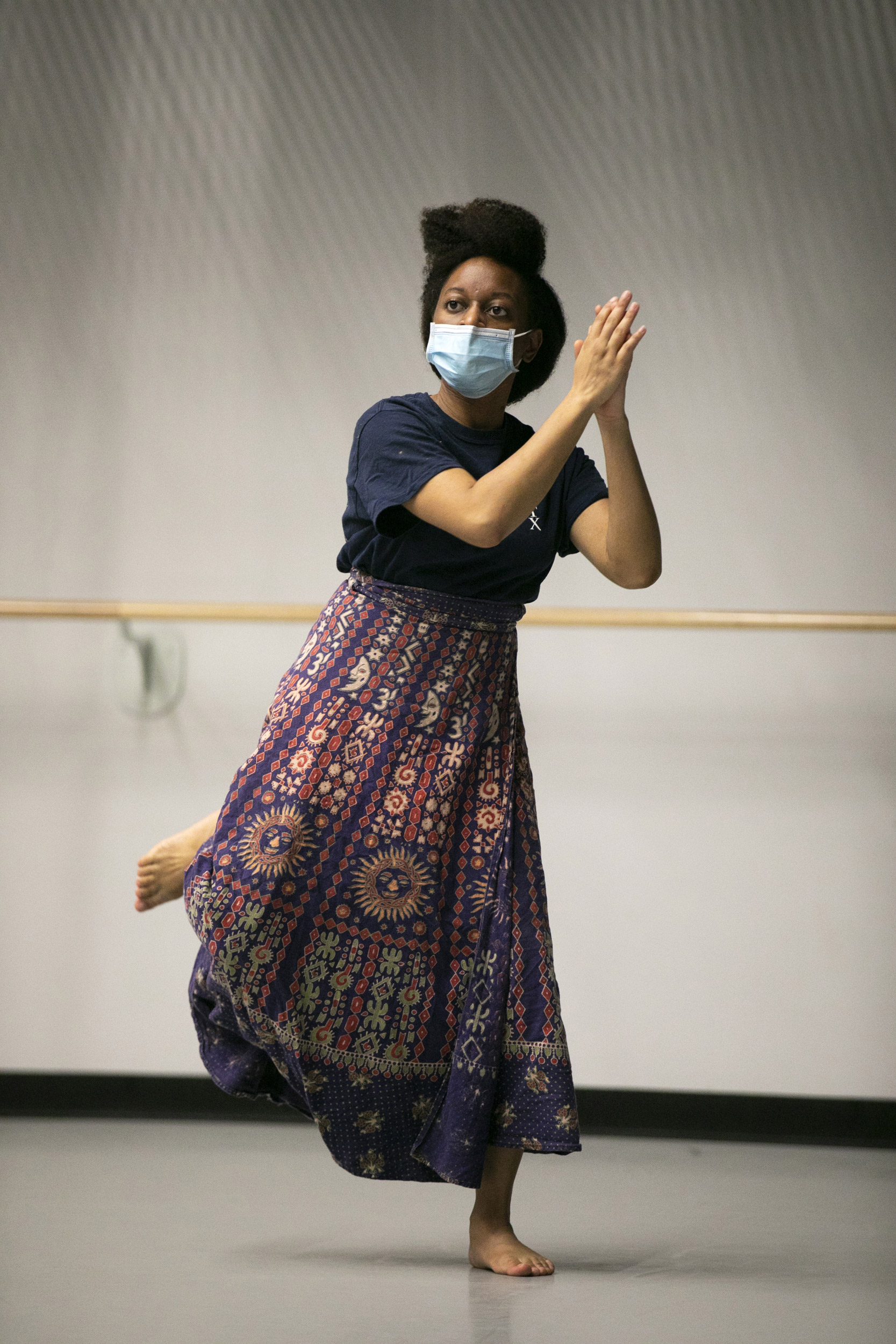 Prince Jenkins dances during West African dance class.