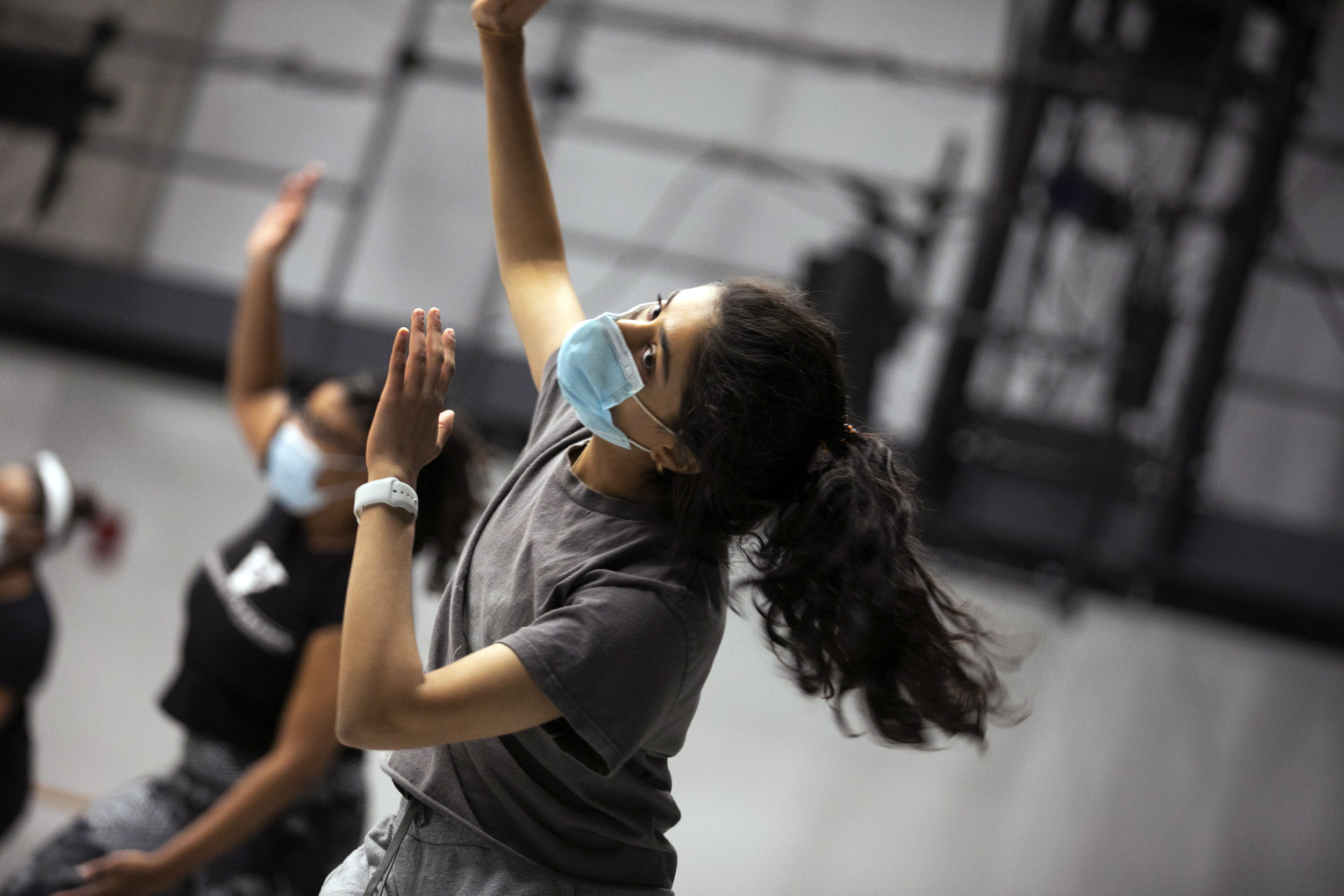 Riya Kapoor dances during West African dance class.