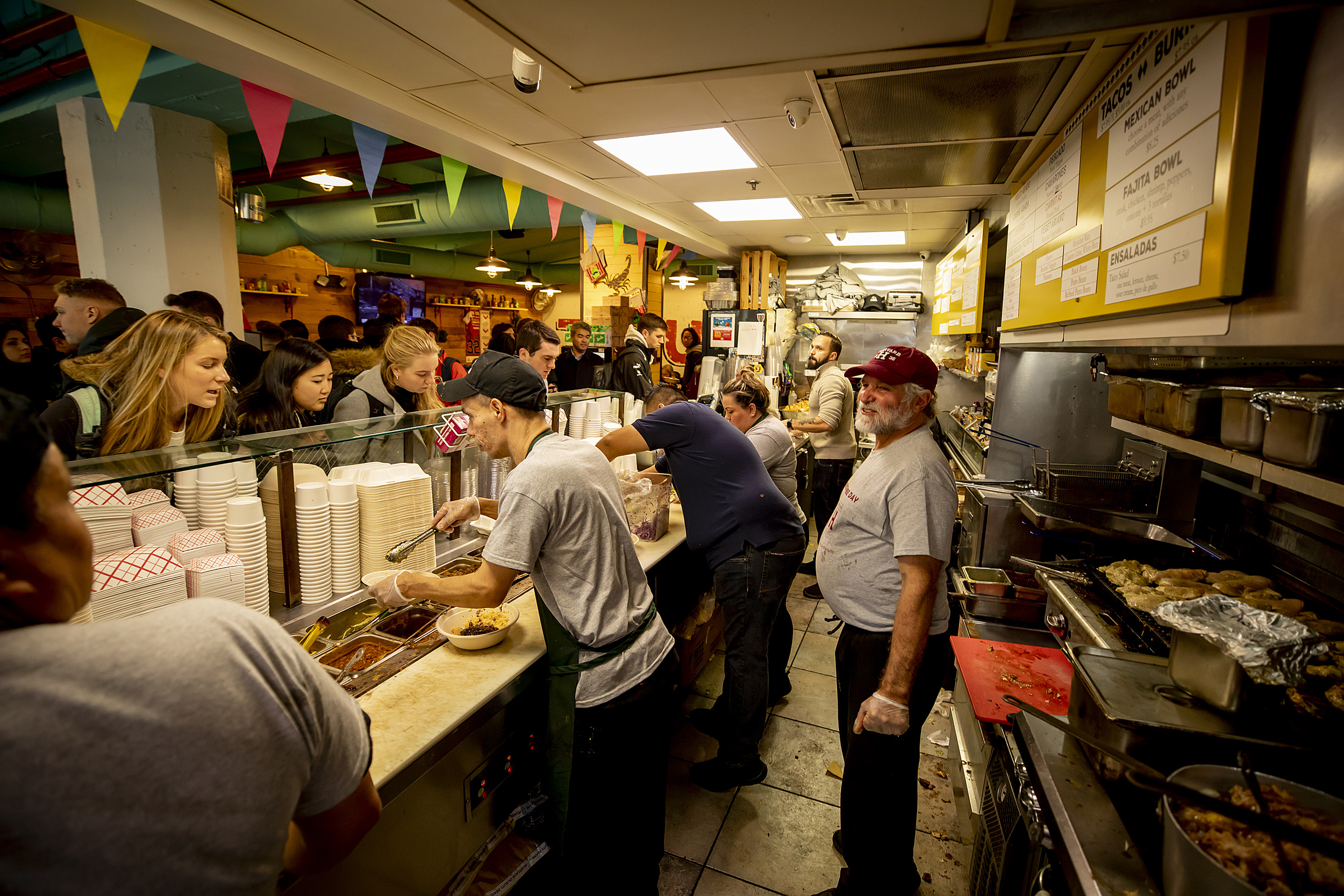 People line up for food at 2018 El Jefe's fundraiser for Ben Abercrombie.