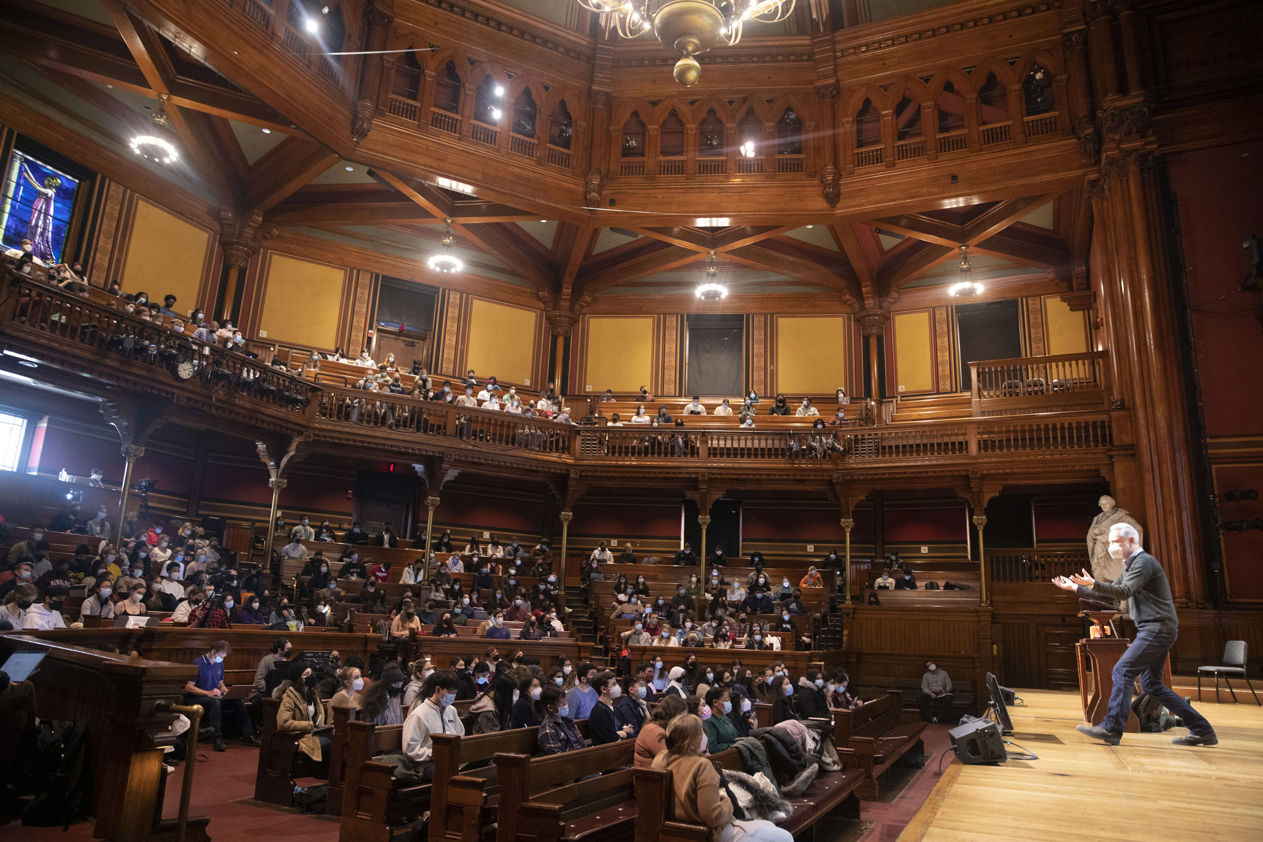 Inside Sanders Theatre, Andrew Berry teaches “Life Sciences.”