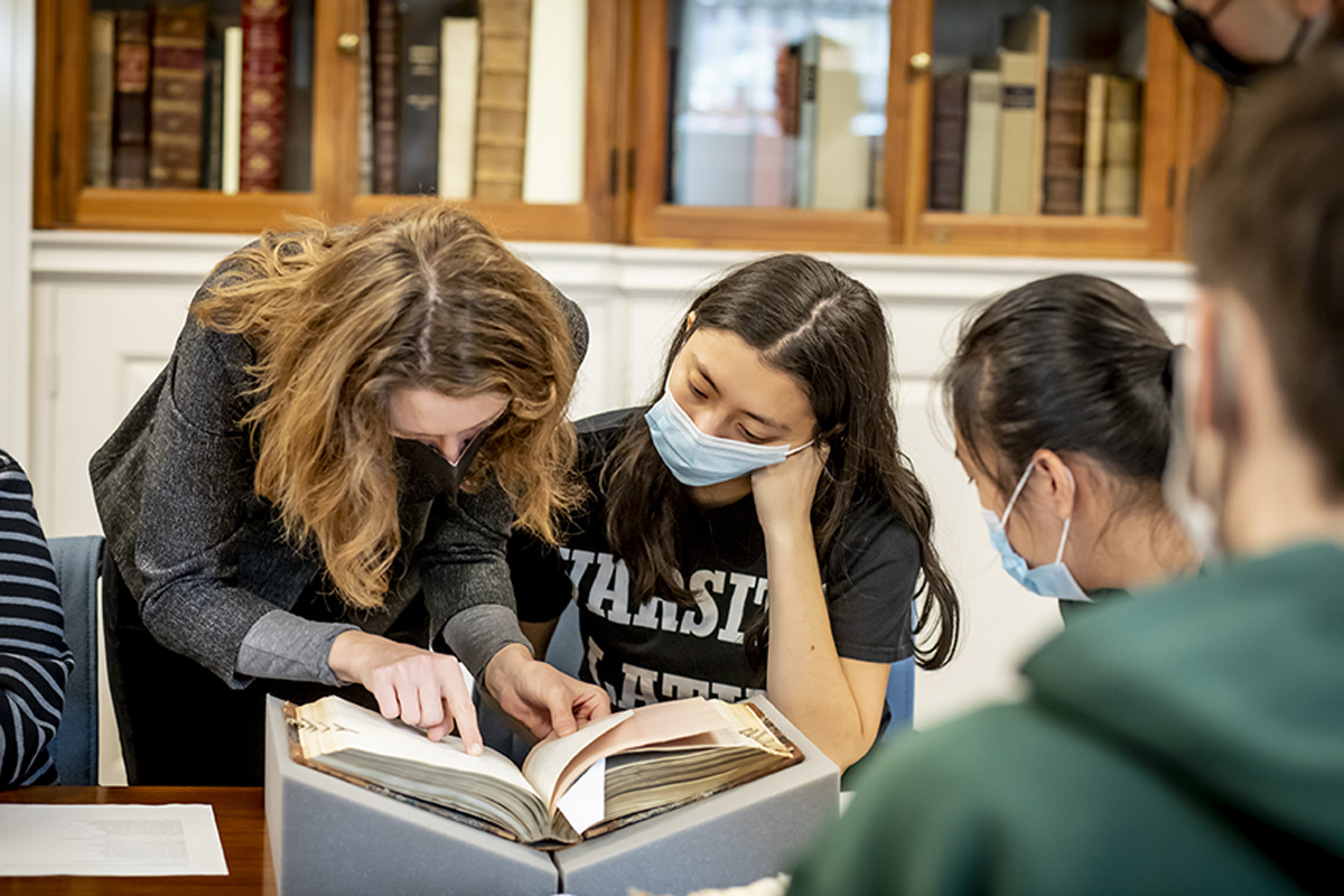 Irene Peirano Garrison works with student Joanna Boyland.