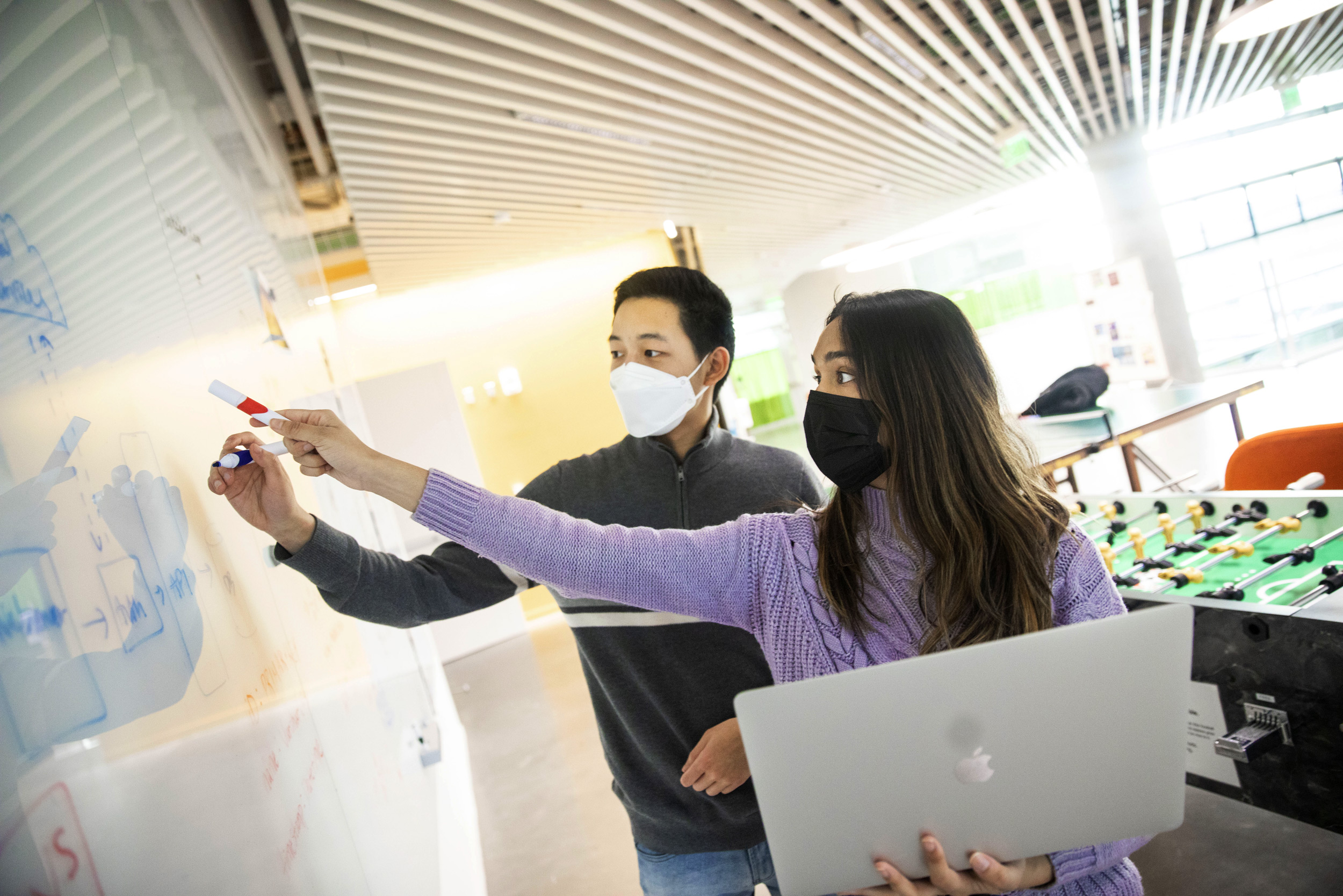 Tulsi Patel ’23 and Eric Li ’24 work together at the SEC.