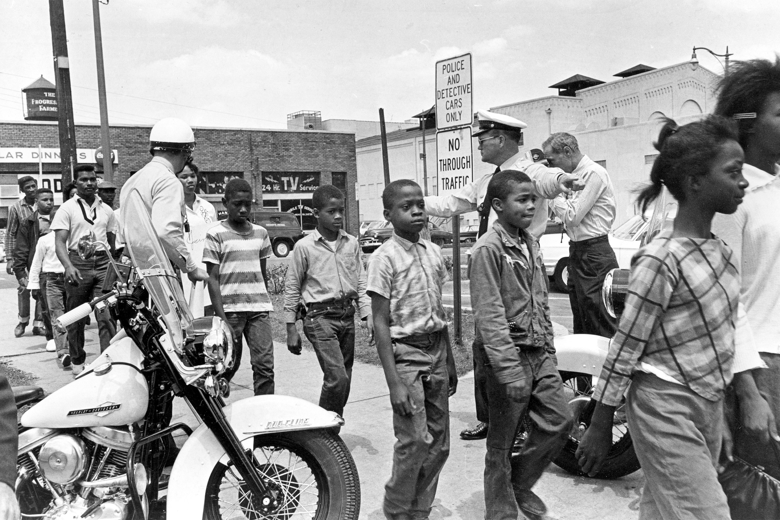 A 1963 photo of police leading a group of Black children to jail.