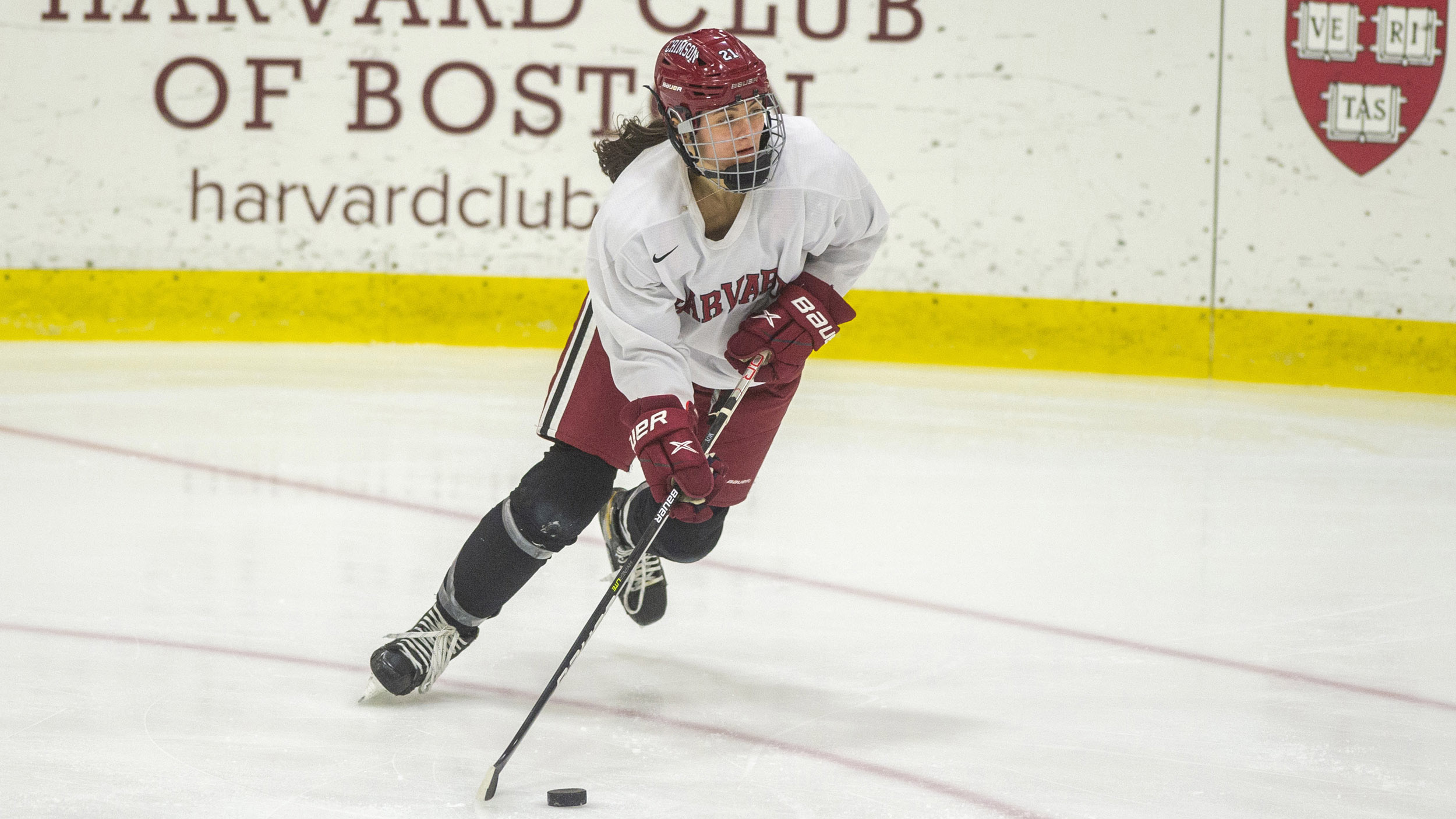 Keely Moy playing hockey.