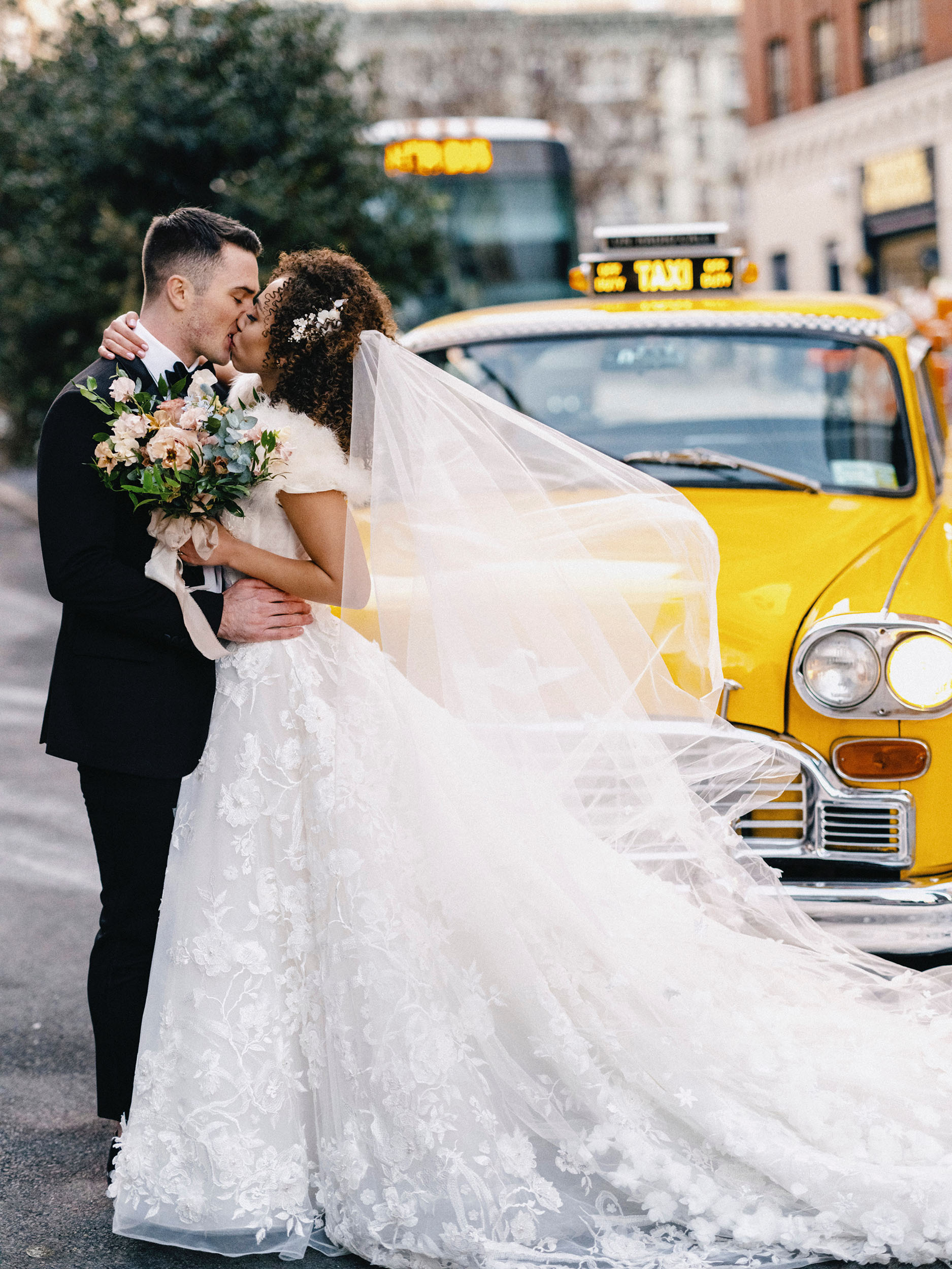 Ashley LaLonde and Noah Reimers kiss on their wedding day.