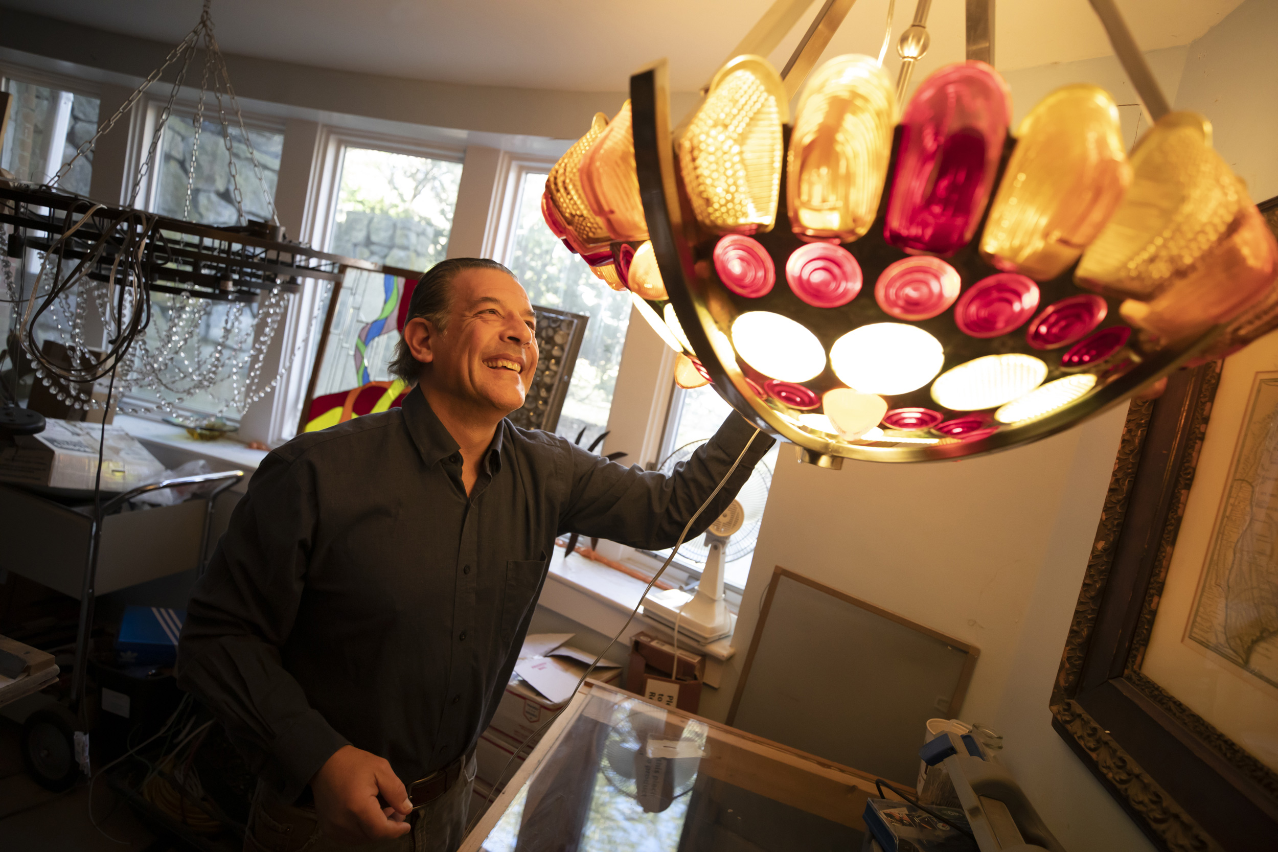 Byron Jelden with chandelier.