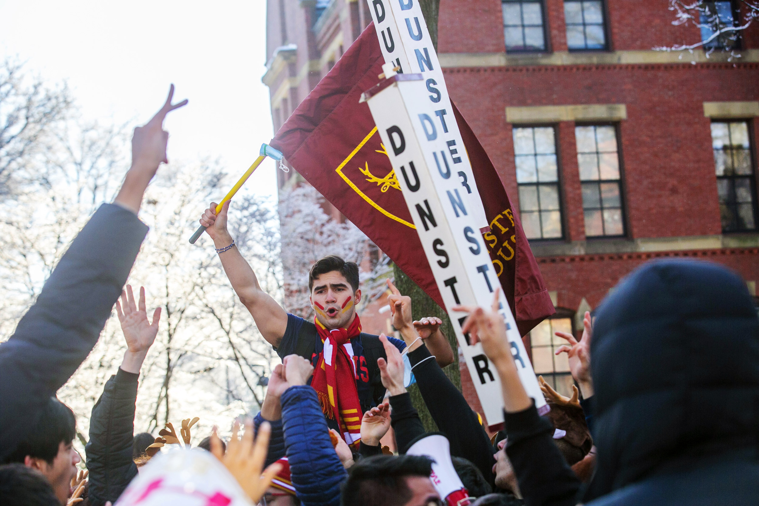 A flag-waving Dunster student rallies the troops.